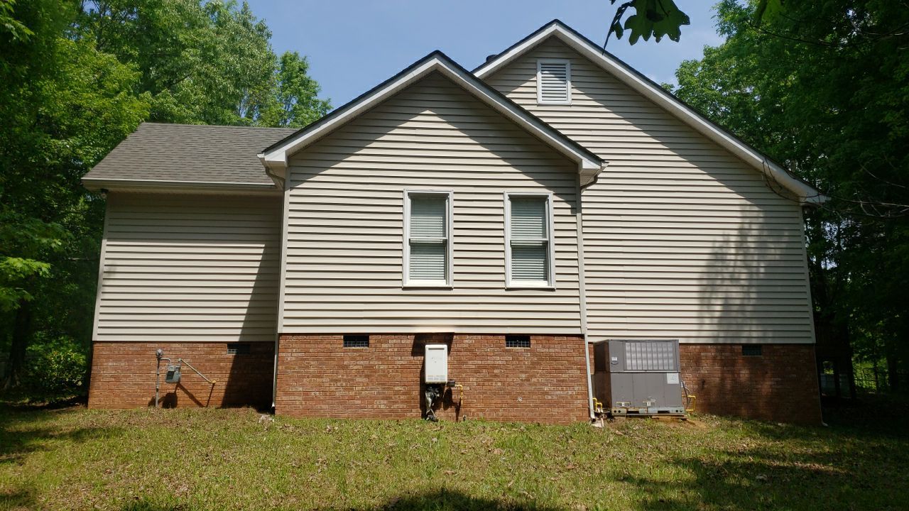 House Wash using cleaner by Power Wash Masters LLC