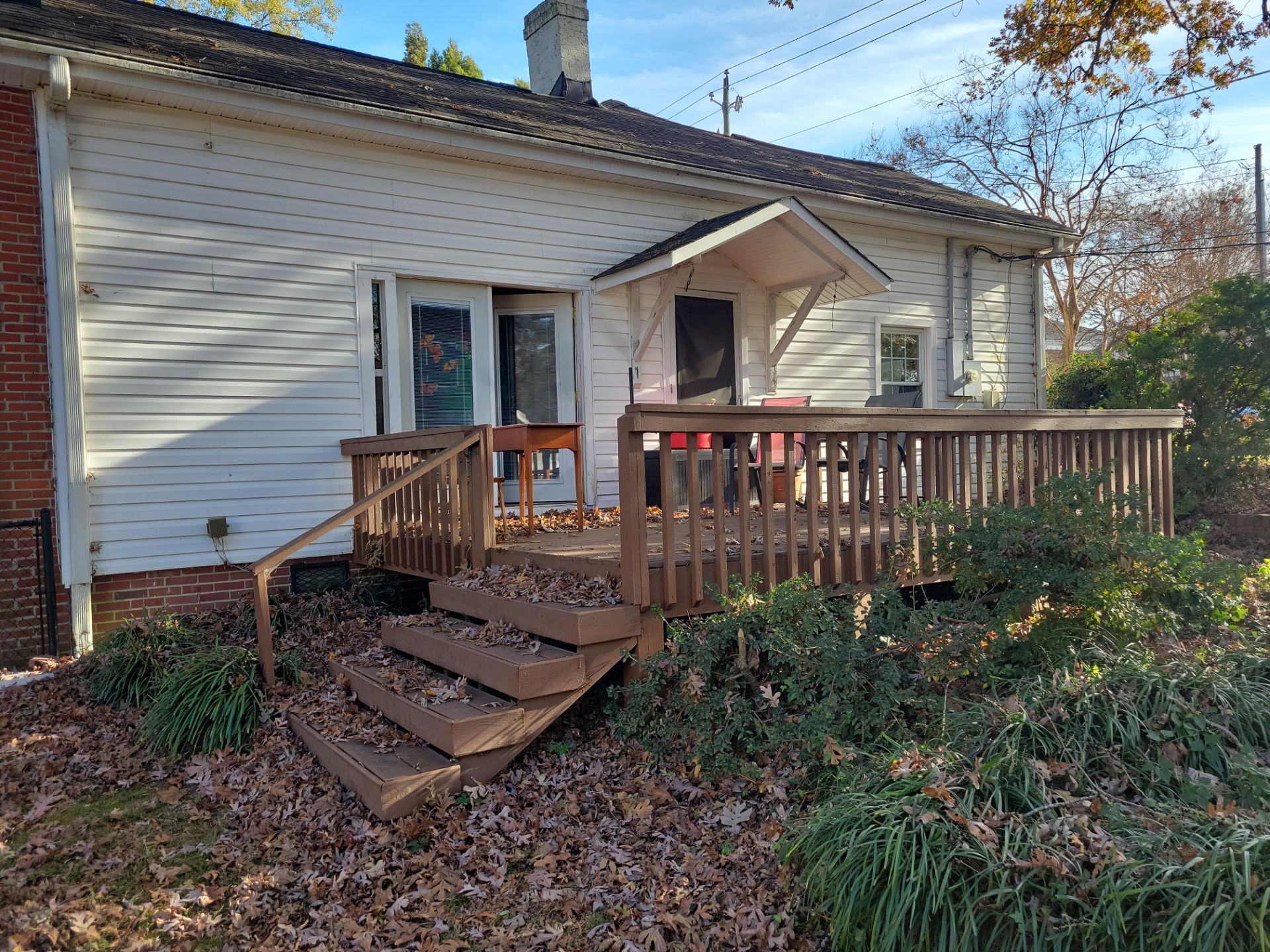 Custom Screened Porch Construction with Gable Roof in Apex by The Remodeling Company