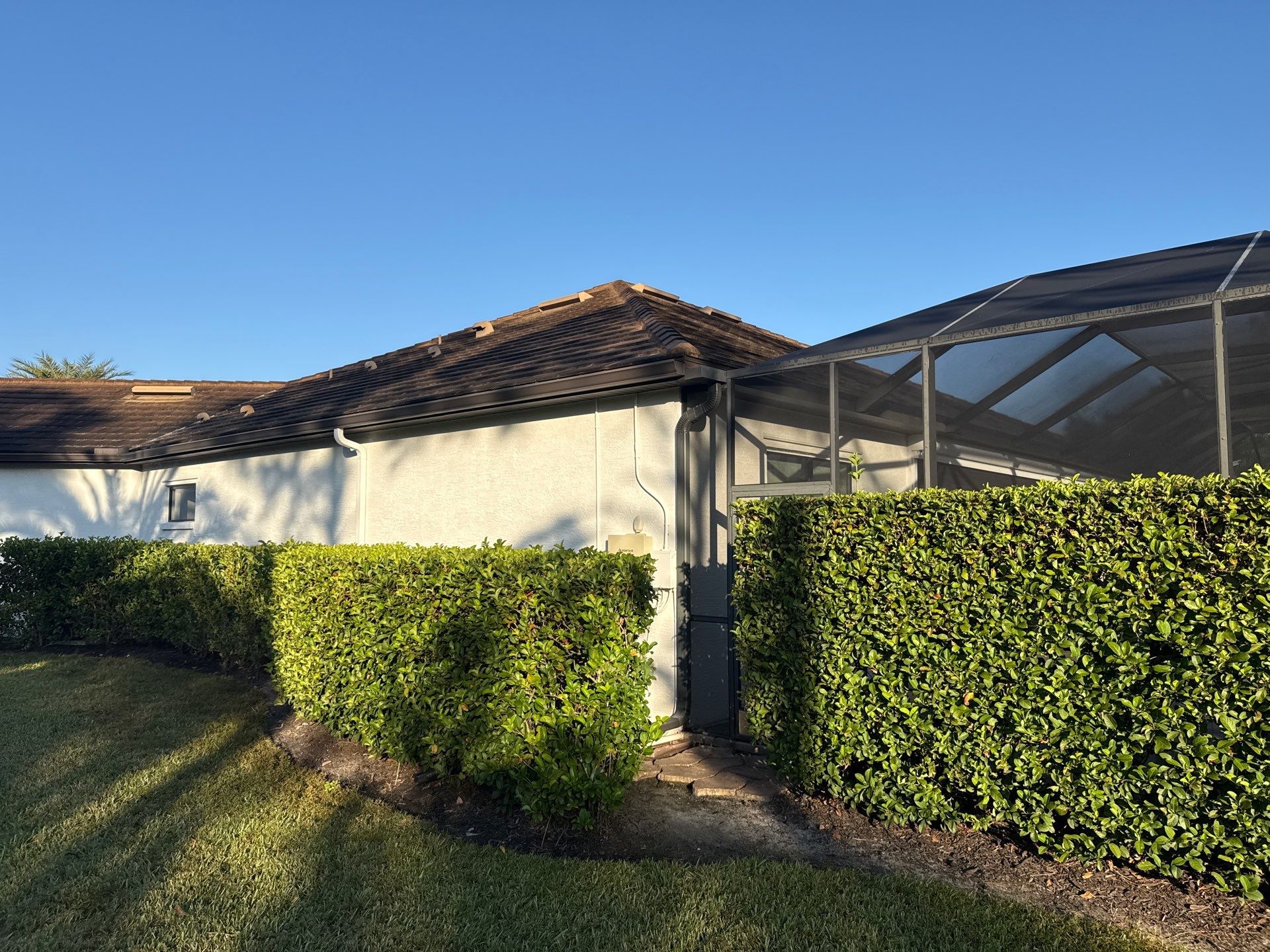 Flat Tile Roof, Paver Pool Deck & Driveway Cleaning | Cove at Twin Rivers, Parrish FL by Sunshine AquaWash