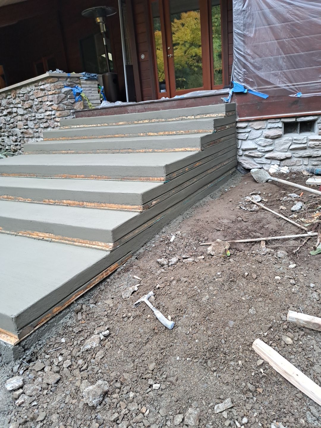 Pia | Custom Concrete Driveway, Walkway & Floating Steps by Jireh Asphalt & Concrete Inc 
