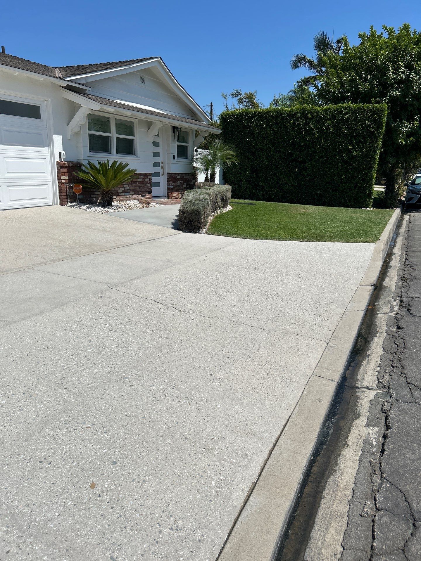 Sandblasting Paint Off Concrete Driveway In Downey, CA by La Power Washing Inc