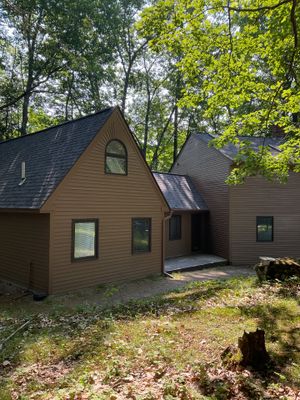 Exterior Wood Siding Restoration and Painting in Wayne, Maine