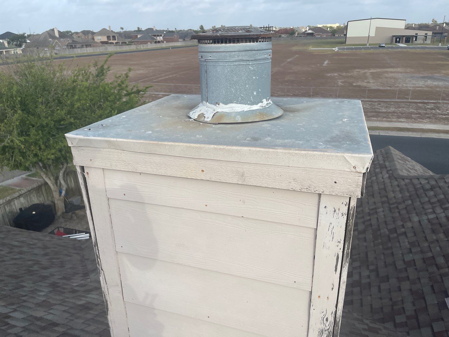 Chimney Cap Replacement using Custom Fabricated Steel by Lighthouse Roofing