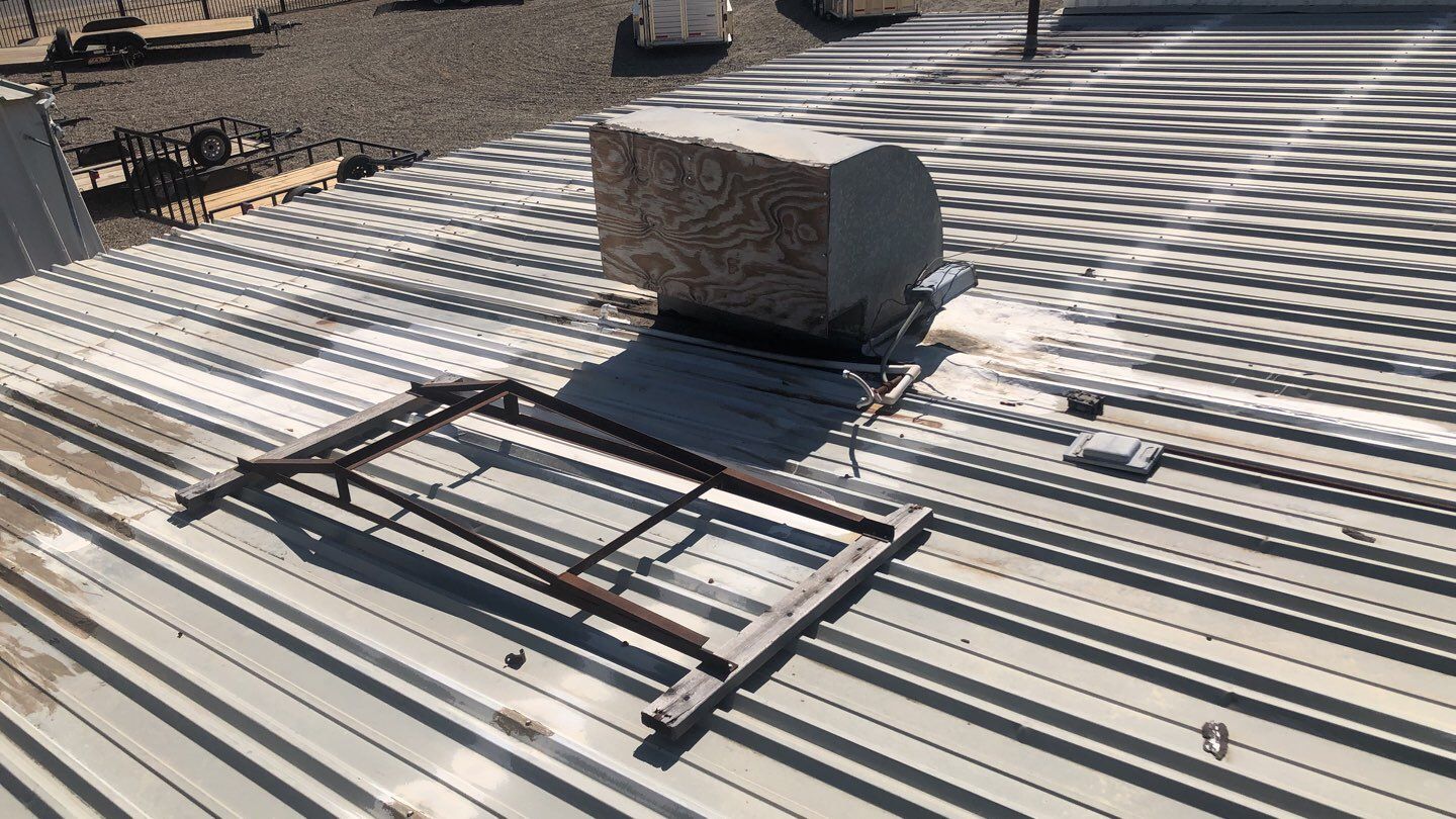 Metal Restoration Roofing system with Benchmark/PUMA XL 20 yr warranty by Straight Edge Roofing Inc