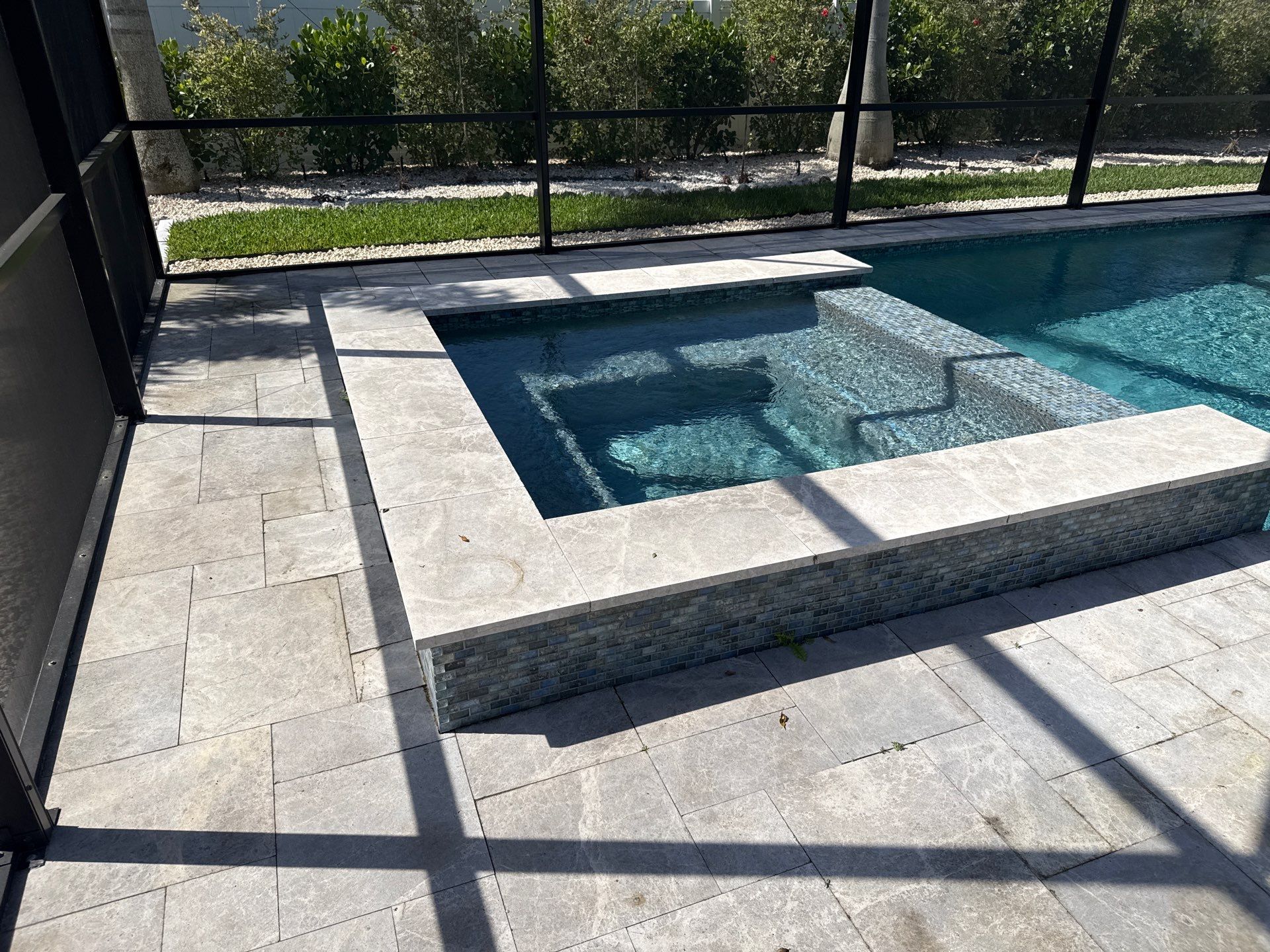 Travertine Pool Deck, Lanai & Screen Enclosure Cleaning Near Manatee River | Bradenton, FL by Sunshine AquaWash
