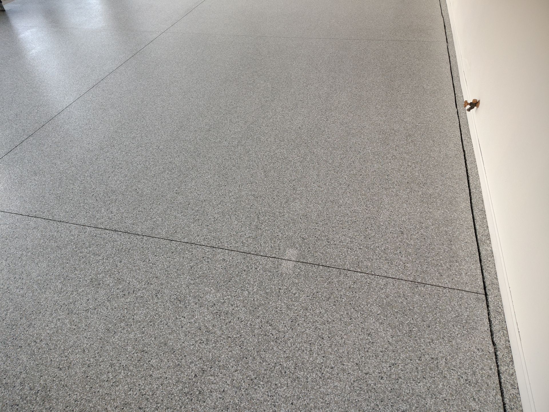 New Johnston Garage Resurfacing by Revival Concrete Coatings, LLC