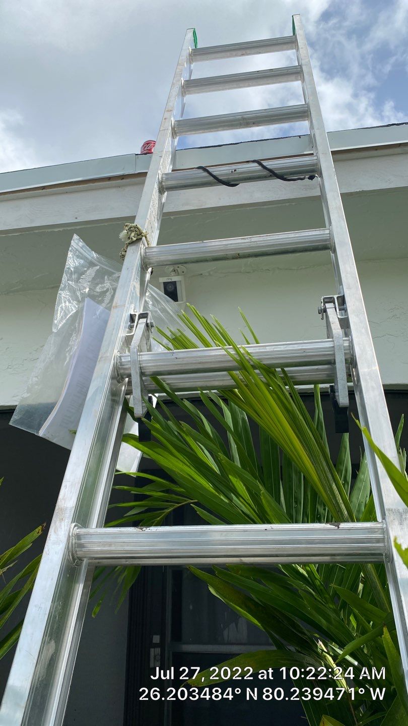 Residential Roofing Installation using 1.5" Nail Strip 24ga Solar White Kynar Coated Standing Seam Metal Panels by Morton Roofing, Inc.