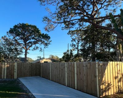 Wood Fence Installation using Board on Board Wood Fence