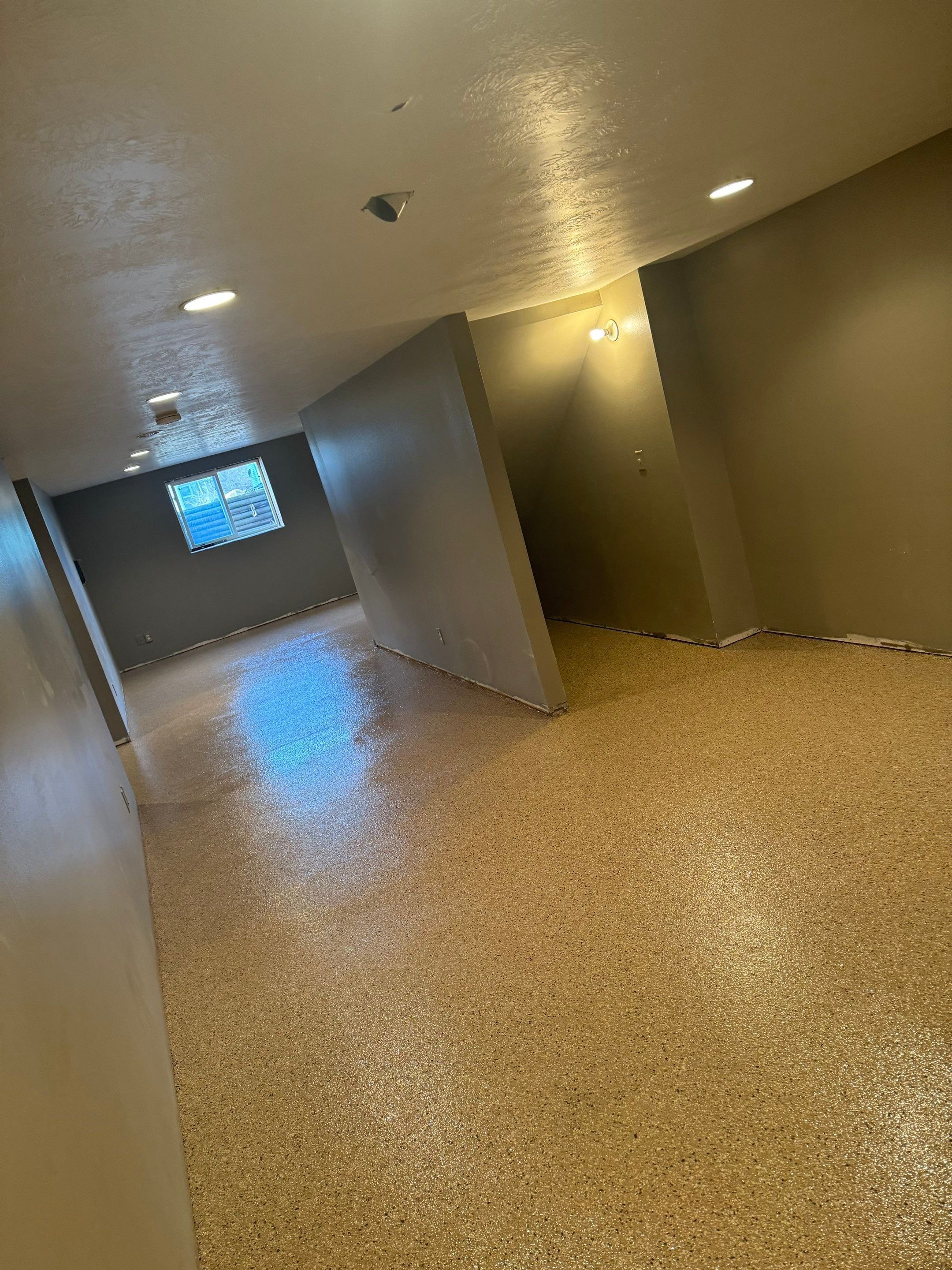 Custom Multi-Fleck Epoxy Floor Coating for Residential Basement by Select Painting, Coatings & Garage Cabinets