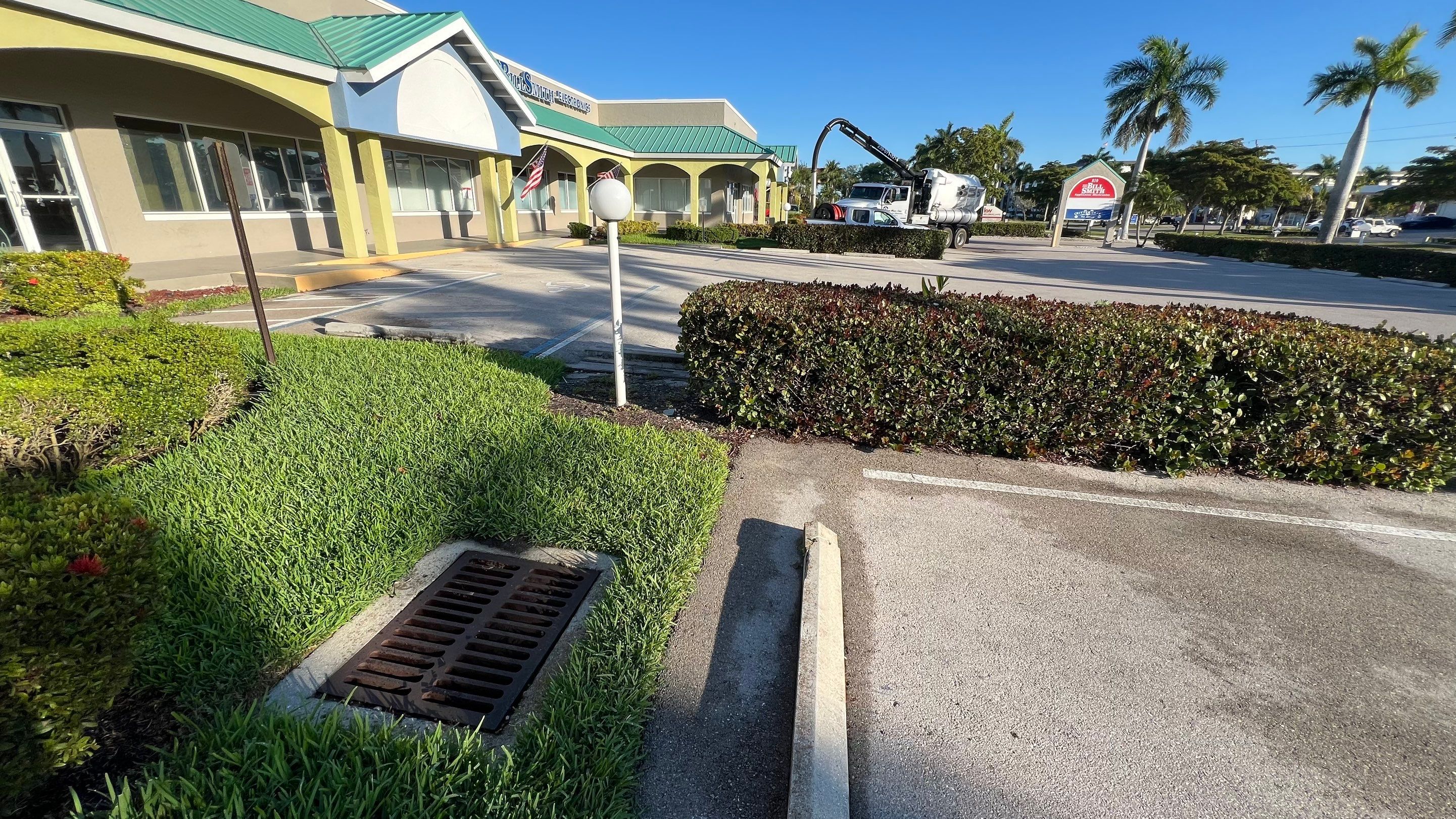 Stromwater System Maintenance at Bill Smith Appliances / Critter Cafe Marco Island Catch Basin by Don Mar, Inc. Storm Water Solutions