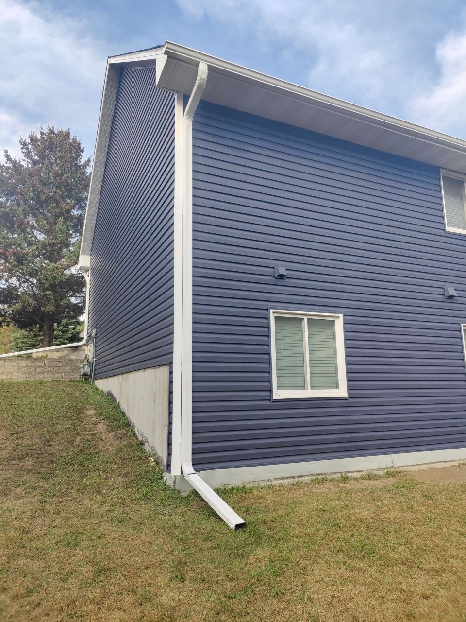 5" Gutters in Woodbury by Next Level Seamless Gutters / Exteriors Inc.