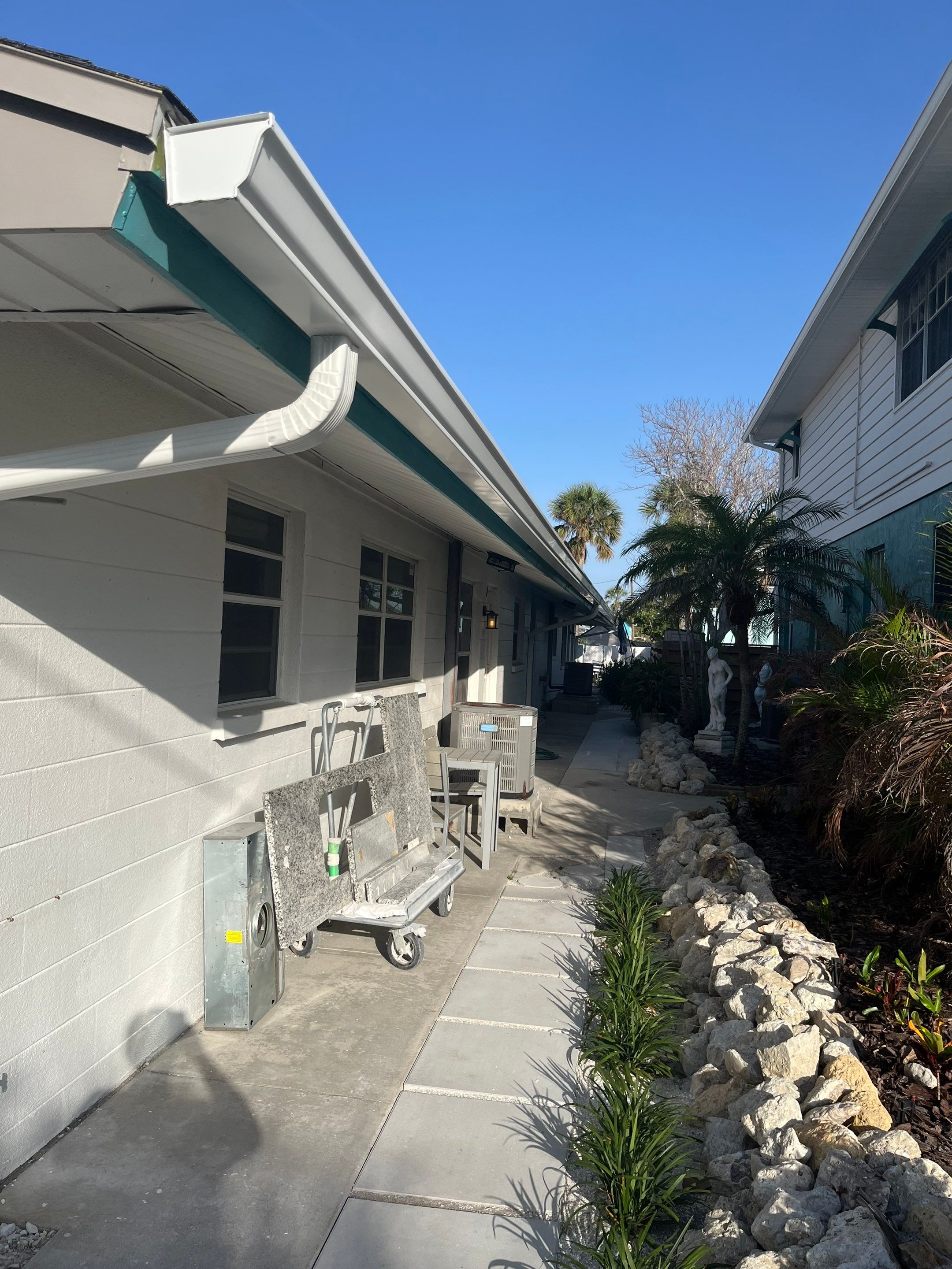 Splash Guard Gutter System and 7-inch Installation in Anna Maria FL by Gutter Professors