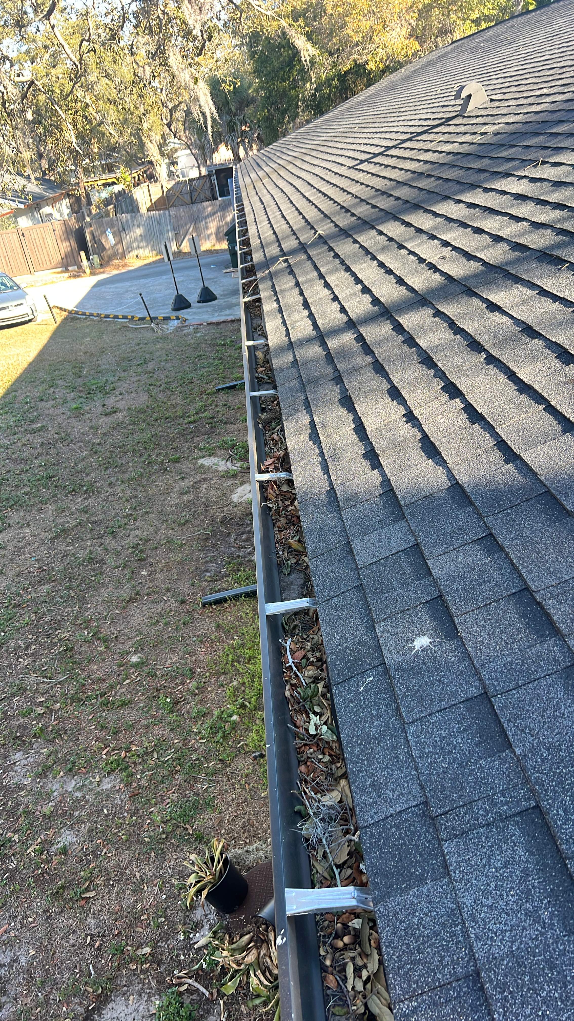 safety harbor gutter cleaning job all gutters filles with leaf at residential location