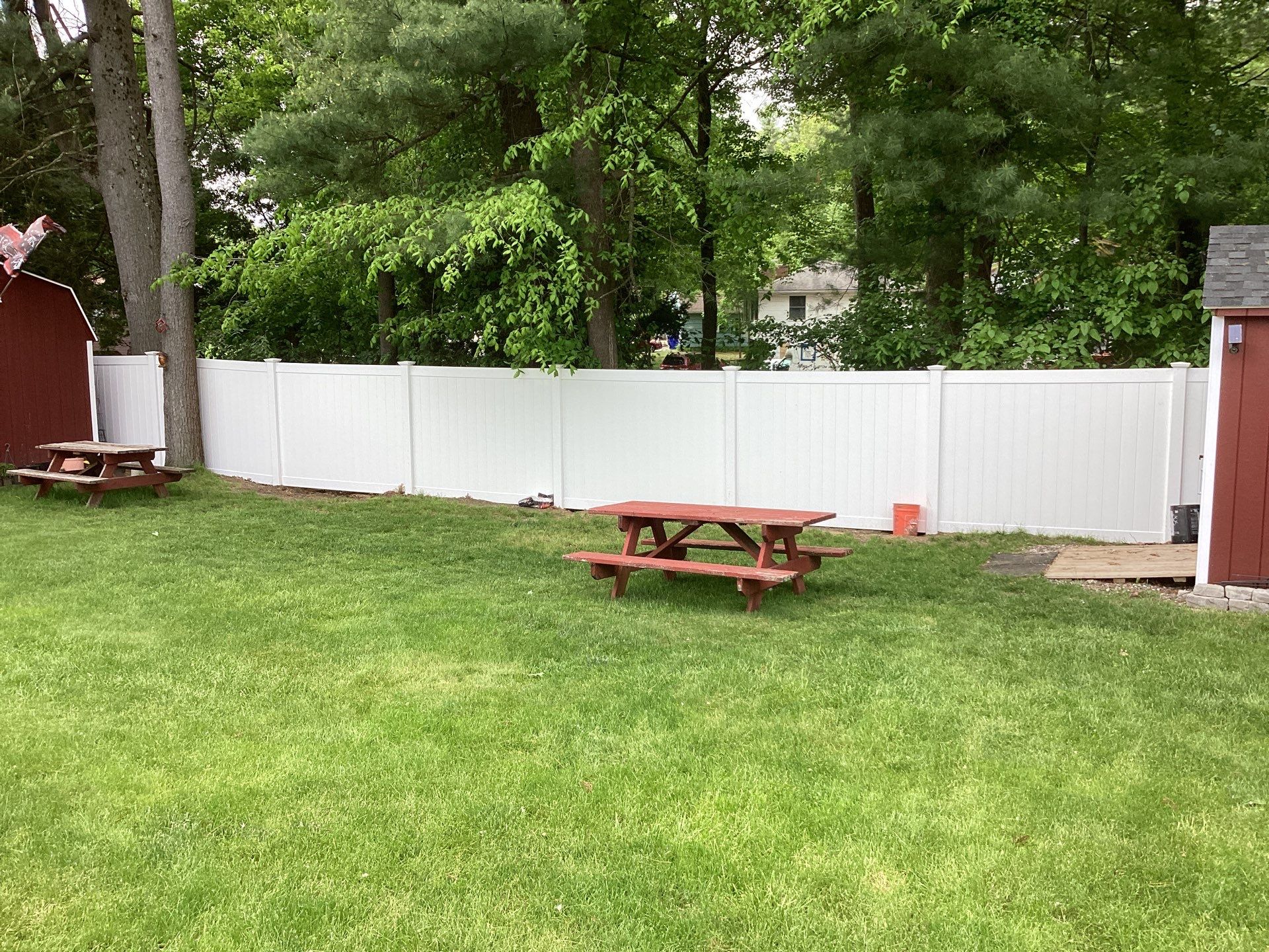 Replacement fence with White Vinyl Privacy and matching gates.  by DiGiorgi Roofing and Siding Inc