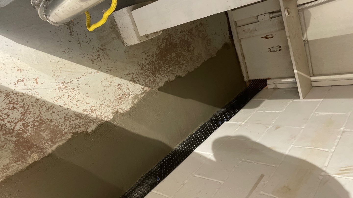Basement Drain Tile & Sump Pump in Northeast Minneapolis by Waterproofing Northeast