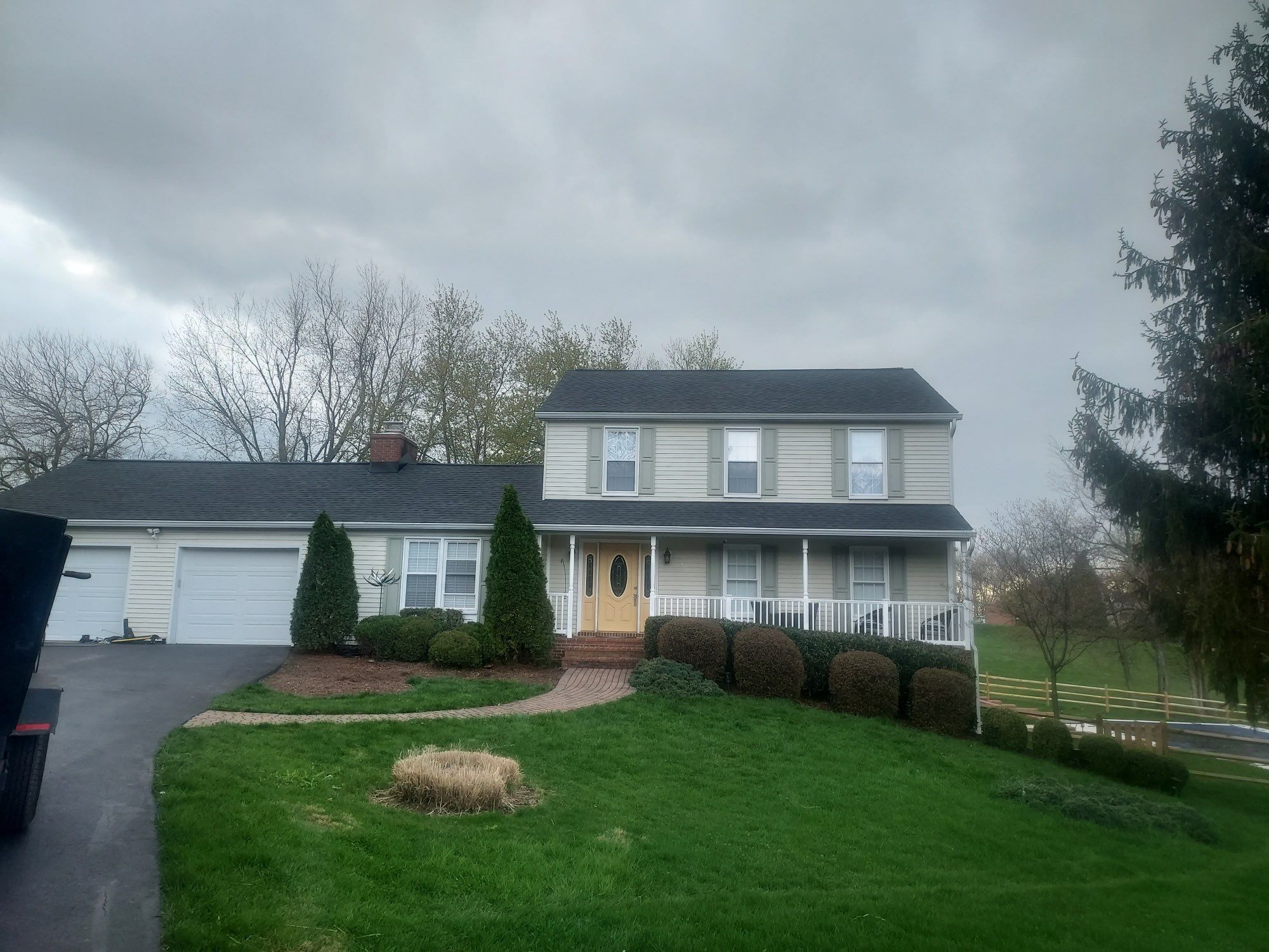 Residential Roofing Installation using Atlas Pinnacle Pristine Black Architectural Shingles by Frederick Roof Repair