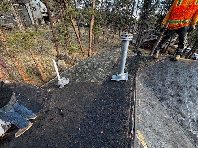 Residential Roofing Installation using Standing Seam Metal by Blue Peaks Roofing LLC 