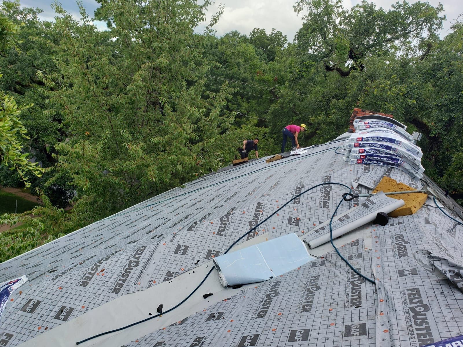 Residential Roofing Installation by American Roofing & Construction LLC