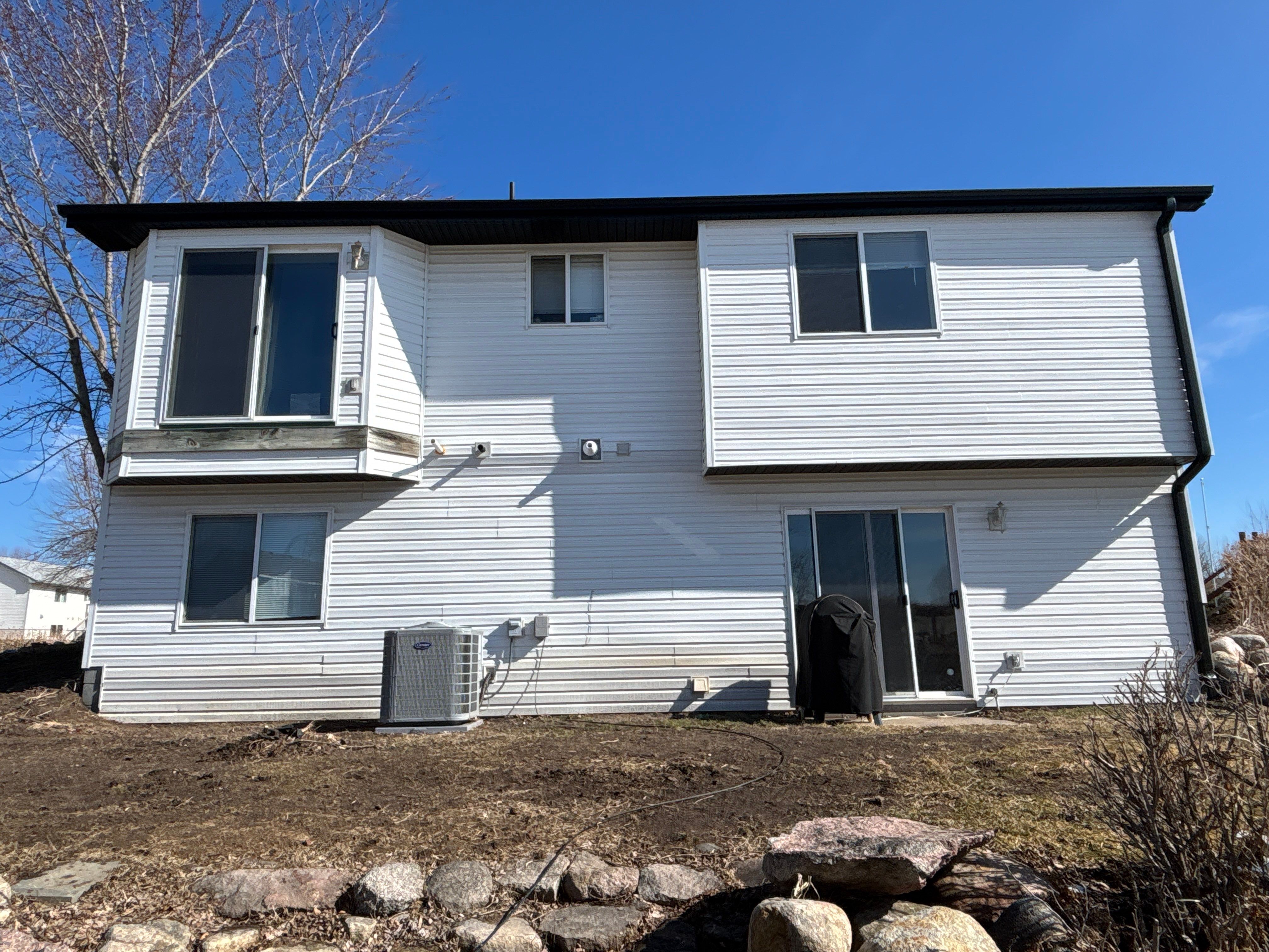 High-Contrast Seamless Gutter Installation for Buffalo Residential Property by Next Level Seamless Gutters / Exteriors Inc.