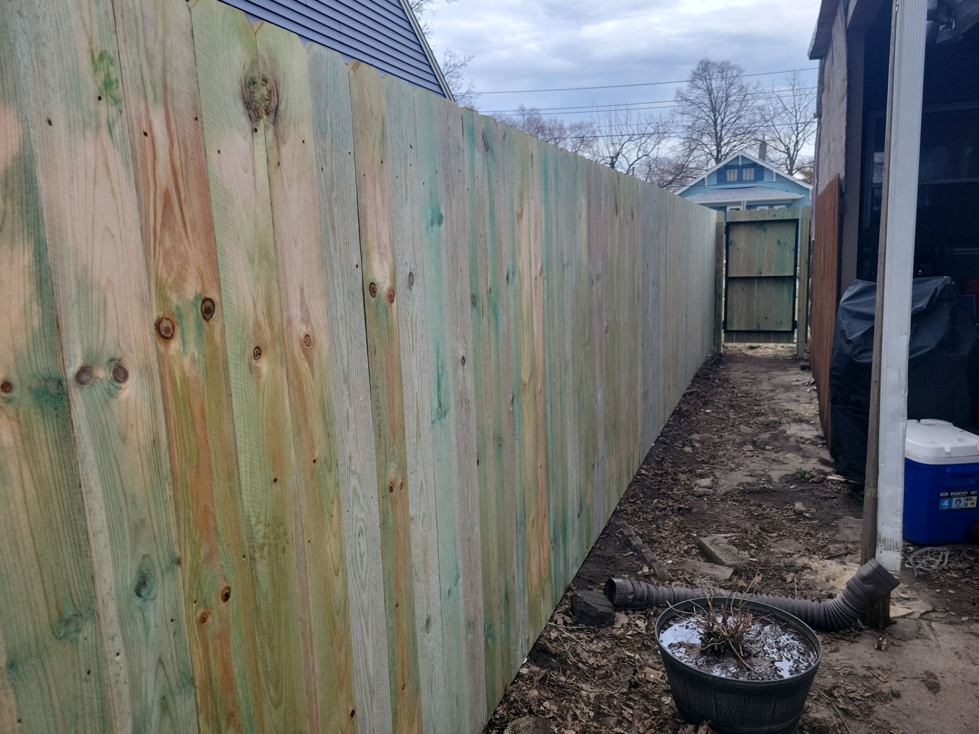 Custom Wood Privacy Fence and Gate Installation in Waterloo by Perfect Picket Fence and Stain