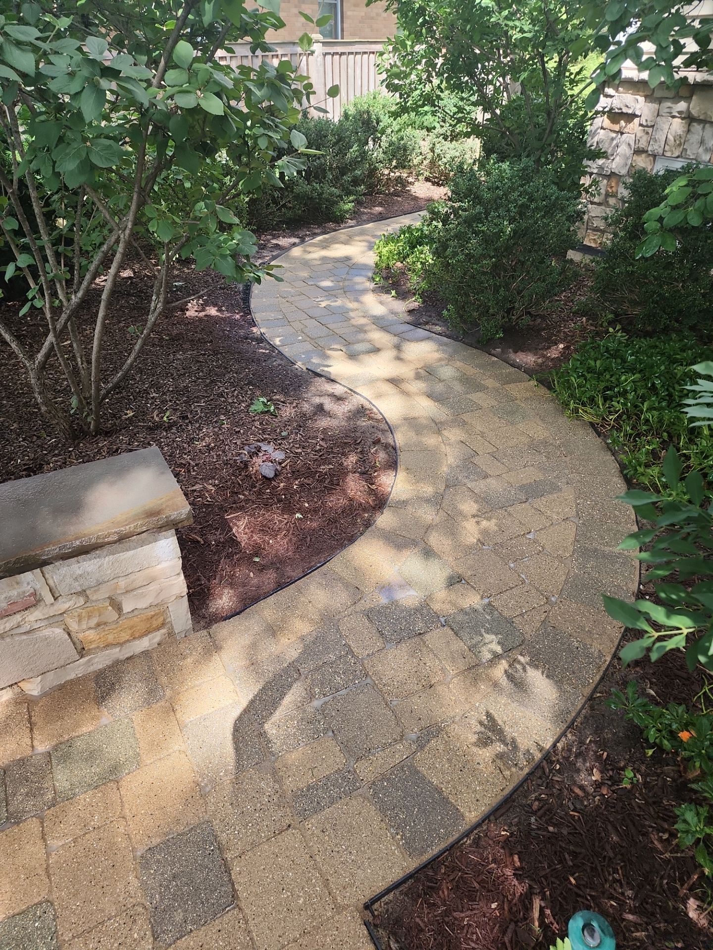 Brick paver cleaning and sanding. by Northern Power Washing LLC.