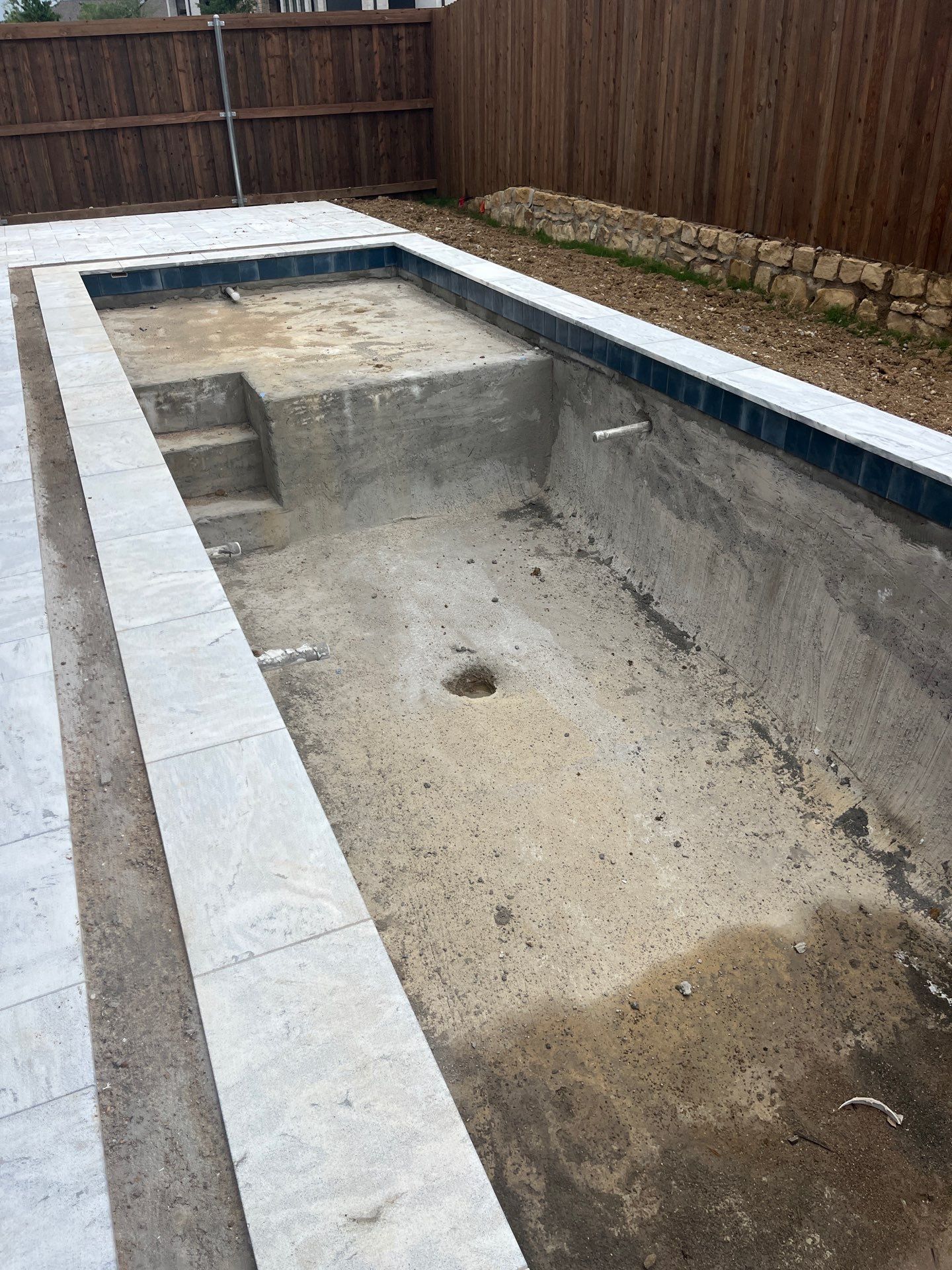Geometric Pool with Raised Spa and Sheer Descent Waterfall by Pinnacle Pools and Spas - DFW