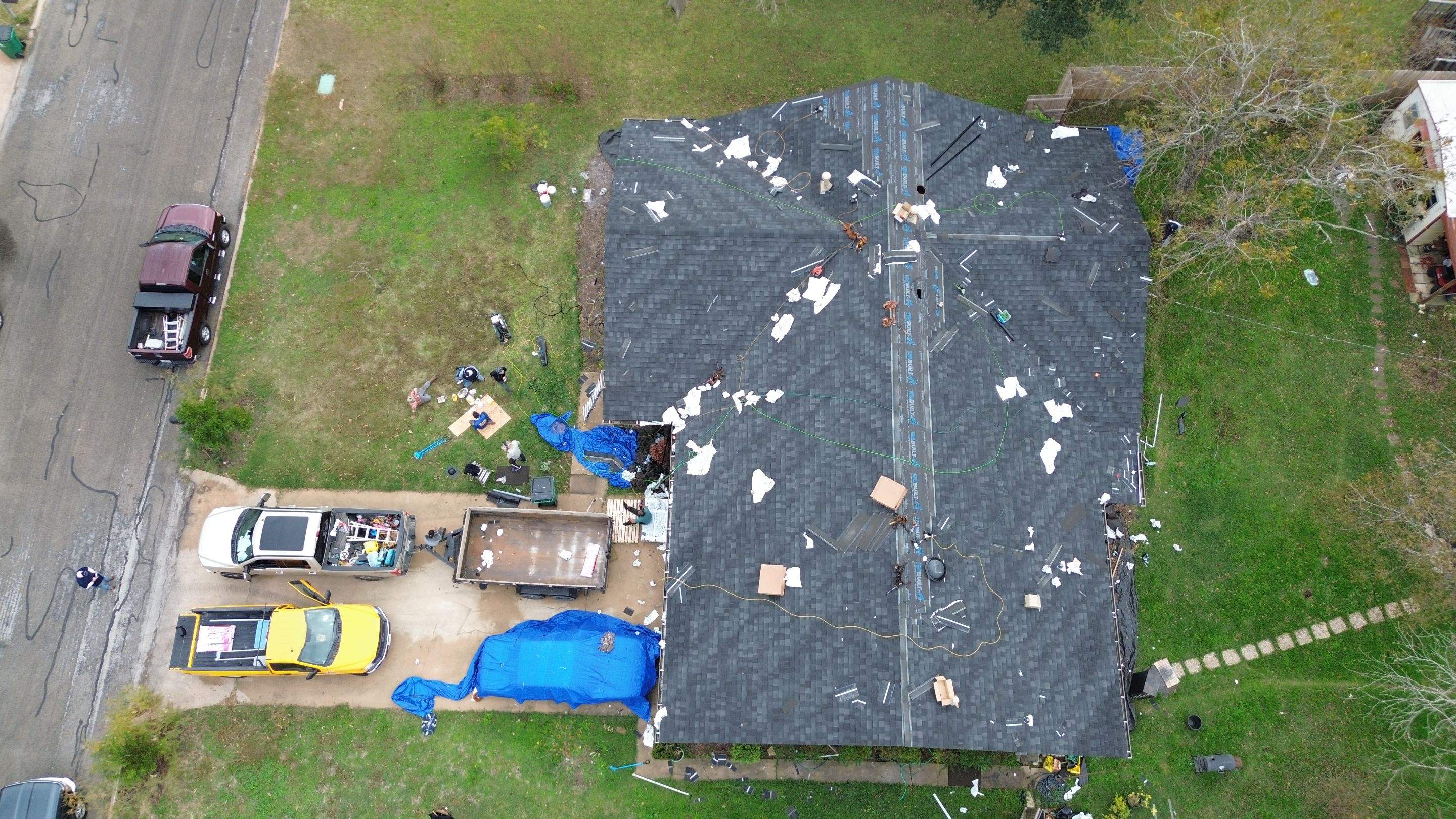 Asphalt Shingle Roof Replacement in Taylor, TX by DeZign Roofing & Exteriors