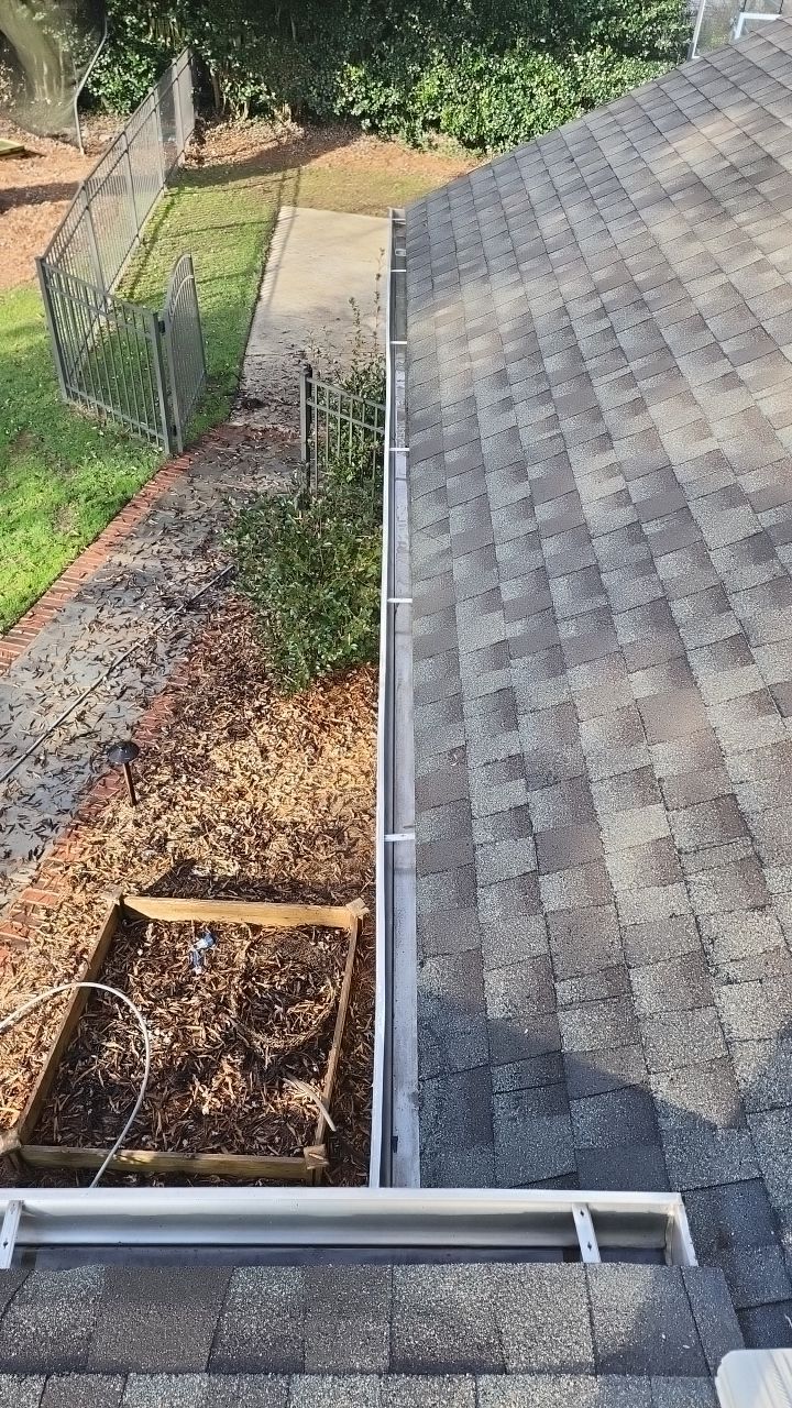 Gutter Cleaning using water by Power Wash Masters LLC