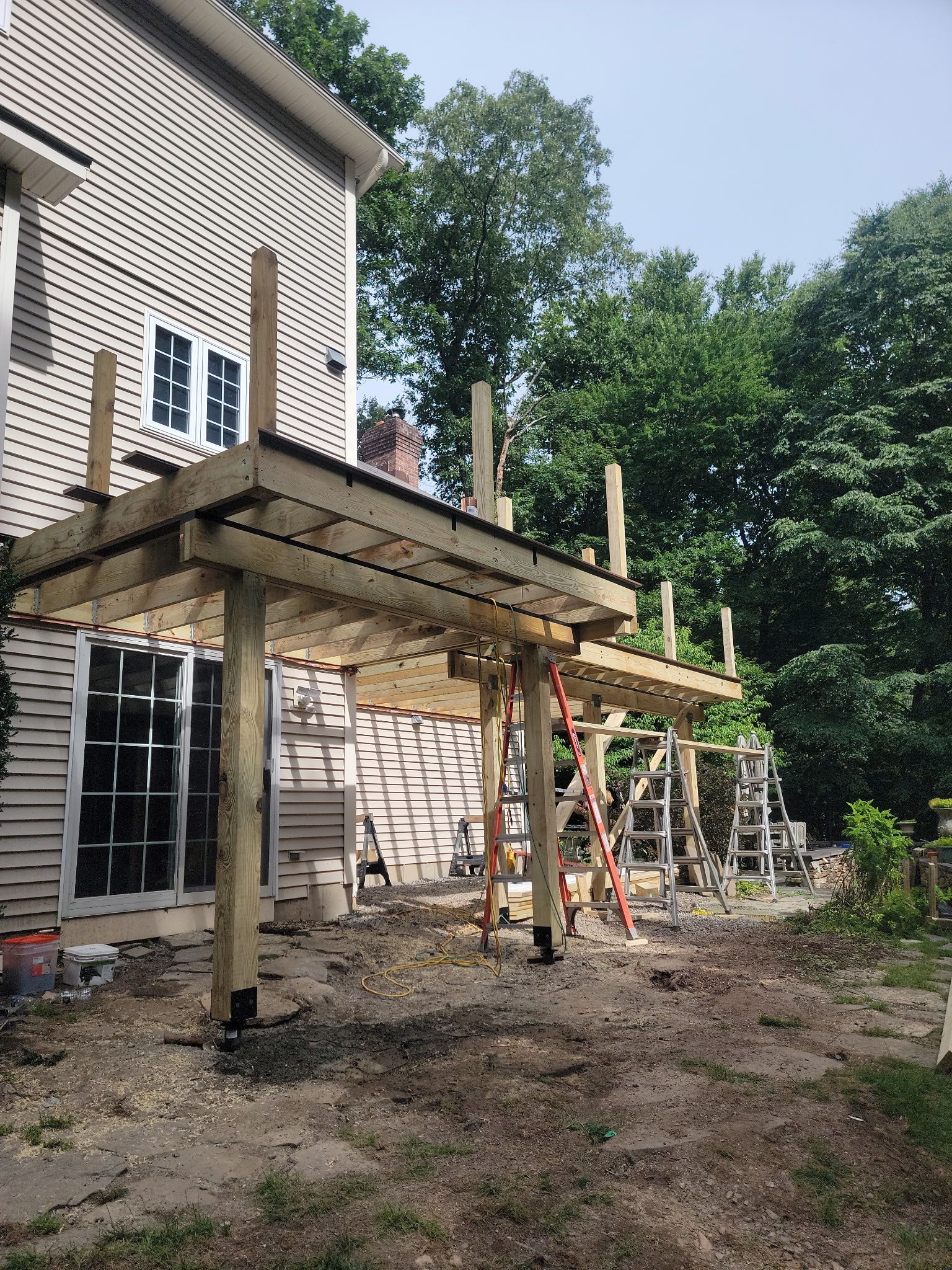 Deck Replacement, using Trex Select Whiskey Barrel and Transcend Railings in Black. by DiGiorgi Roofing and Siding Inc