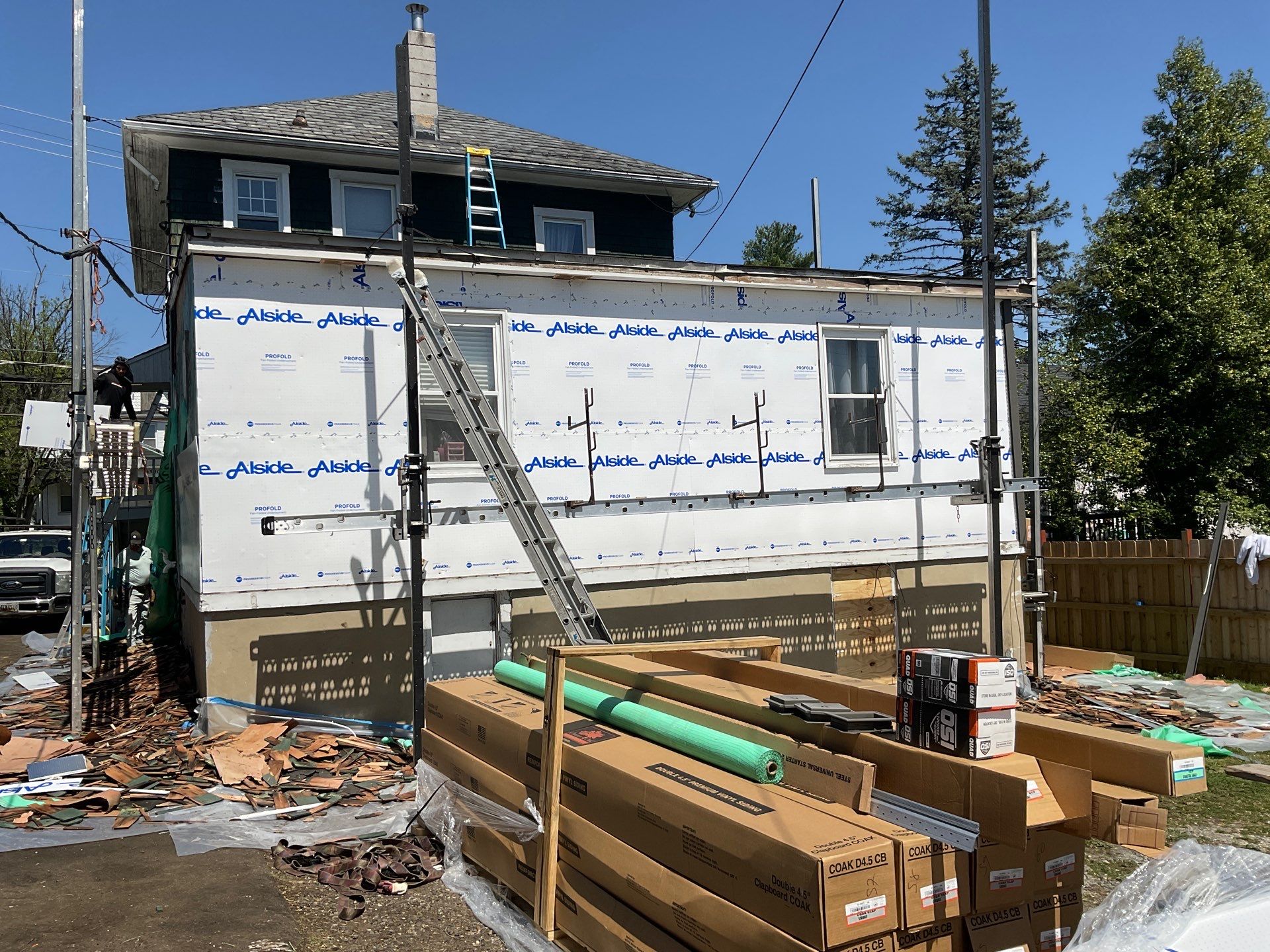New siding & New Gutters by Alpha Design Services