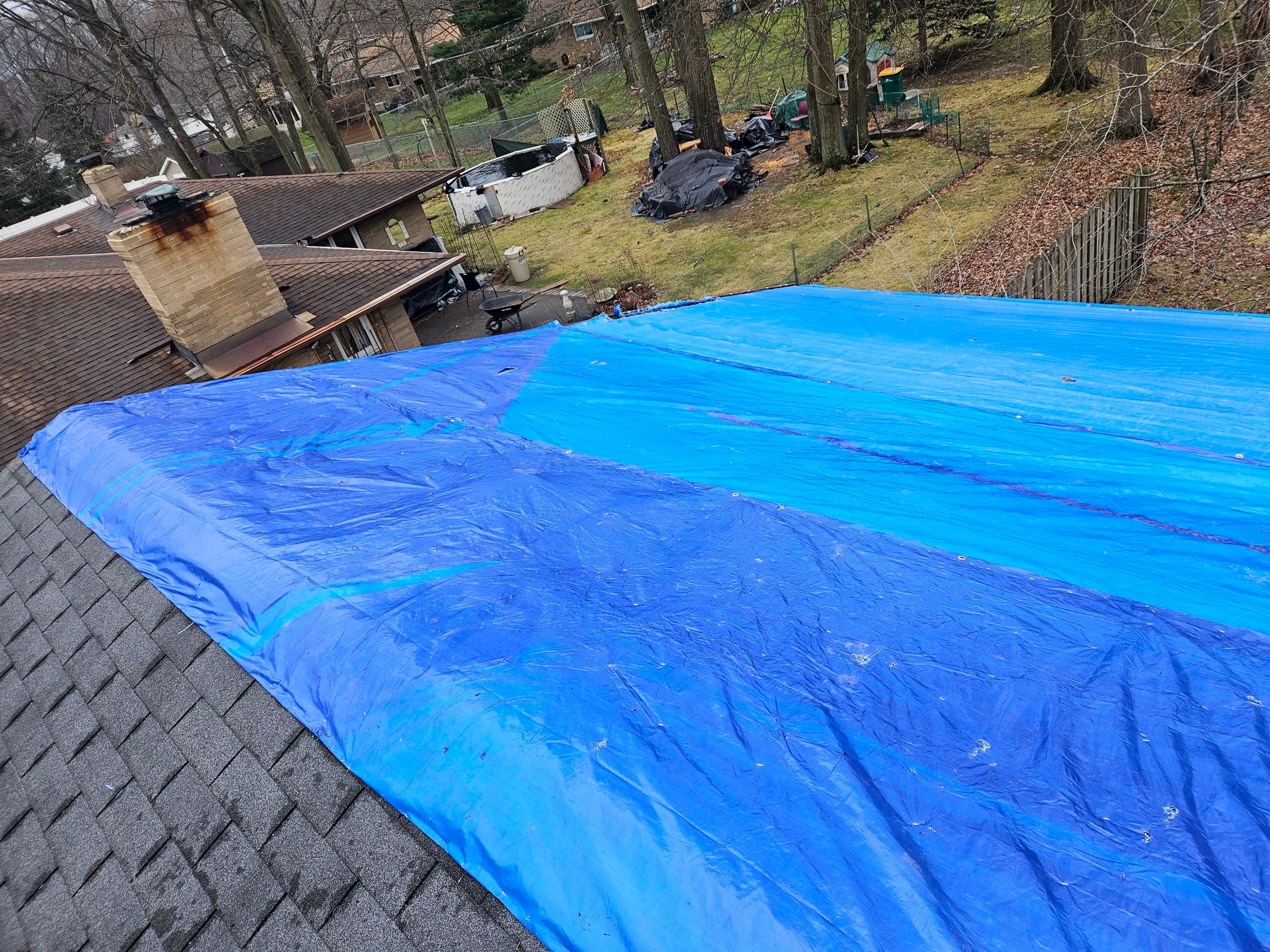 EMERGENCY TARPING ROOF BEFORE STORM using TARP by Absolute Roofing and Construction