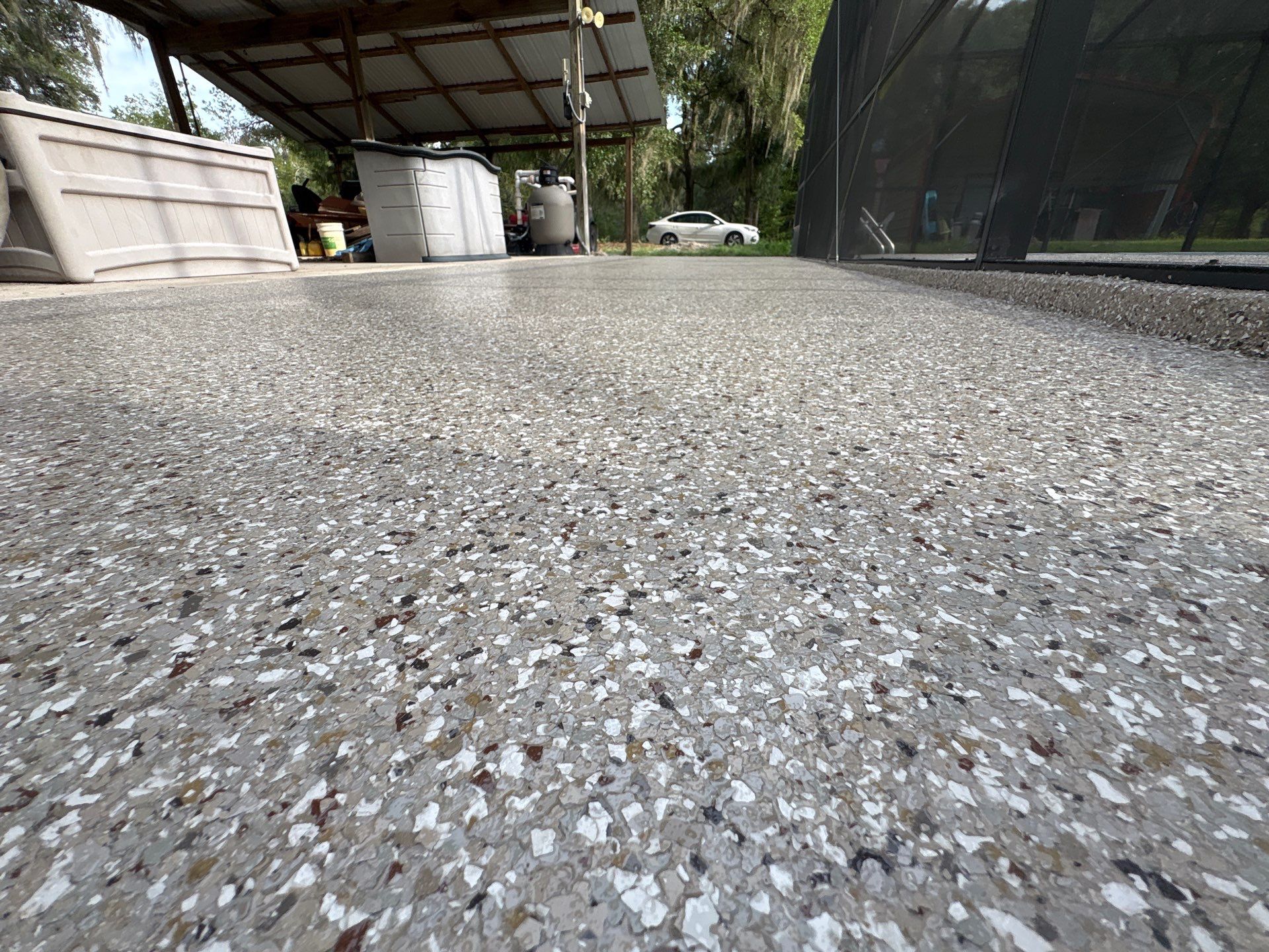 Pool Deck and Driveway in Pebble Beach by Cross Creek Concrete Coatings