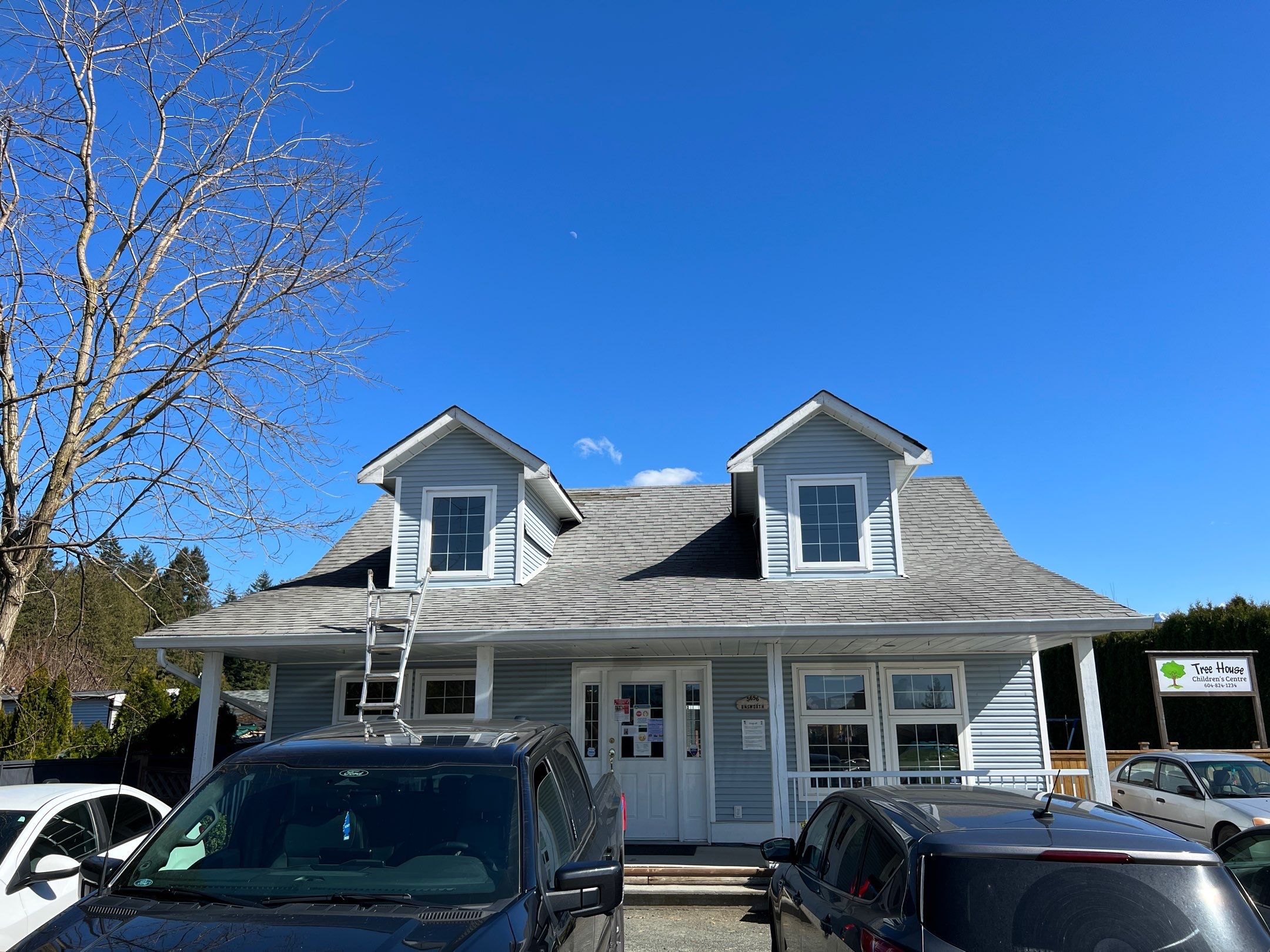 Residential Roofing Installation using Estate Gray Shingles by Top Notch Roofing Inc