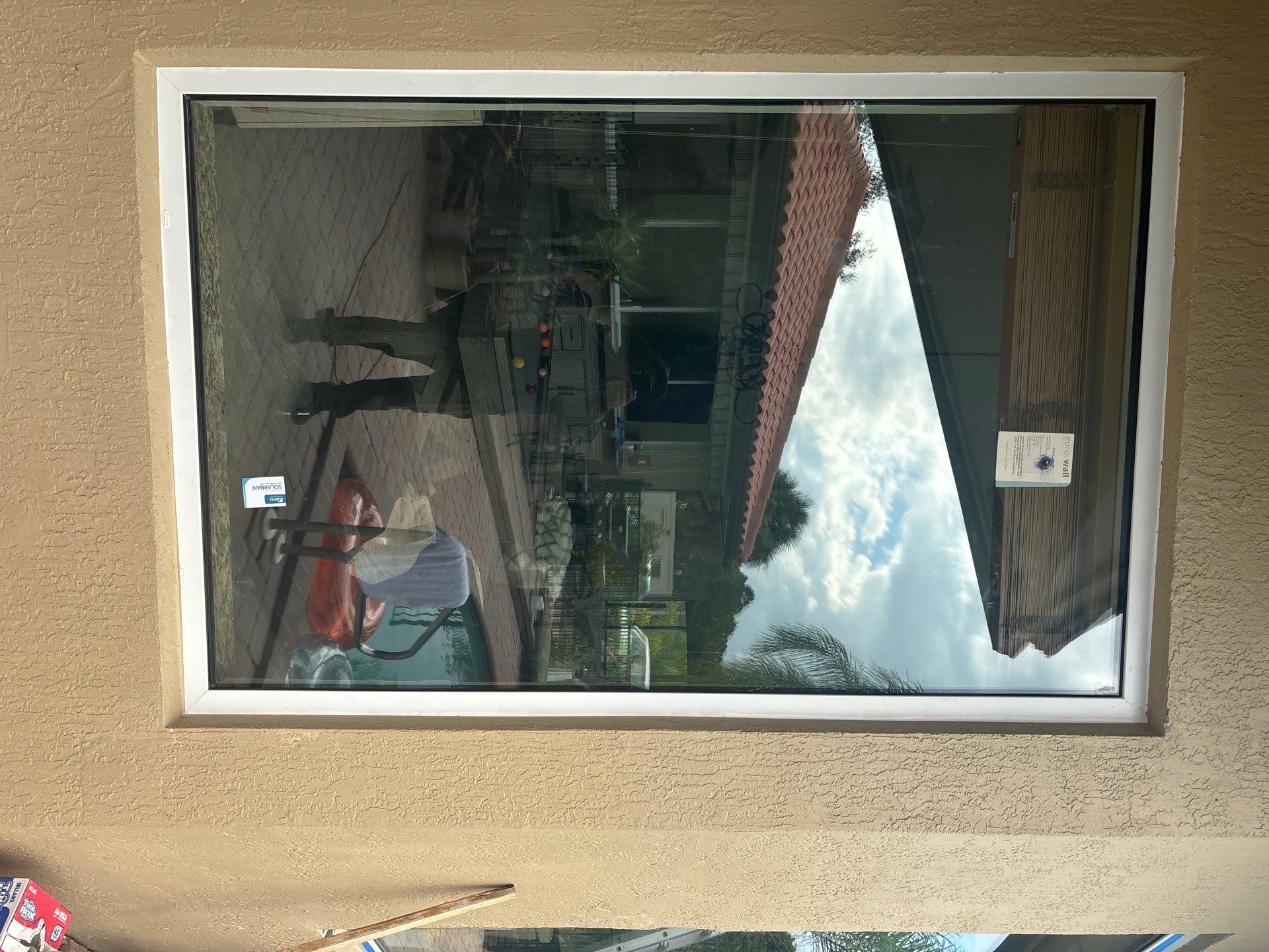 PGT Black pocket doors and Euro-Wall storefront & SGD by Windows For Life 