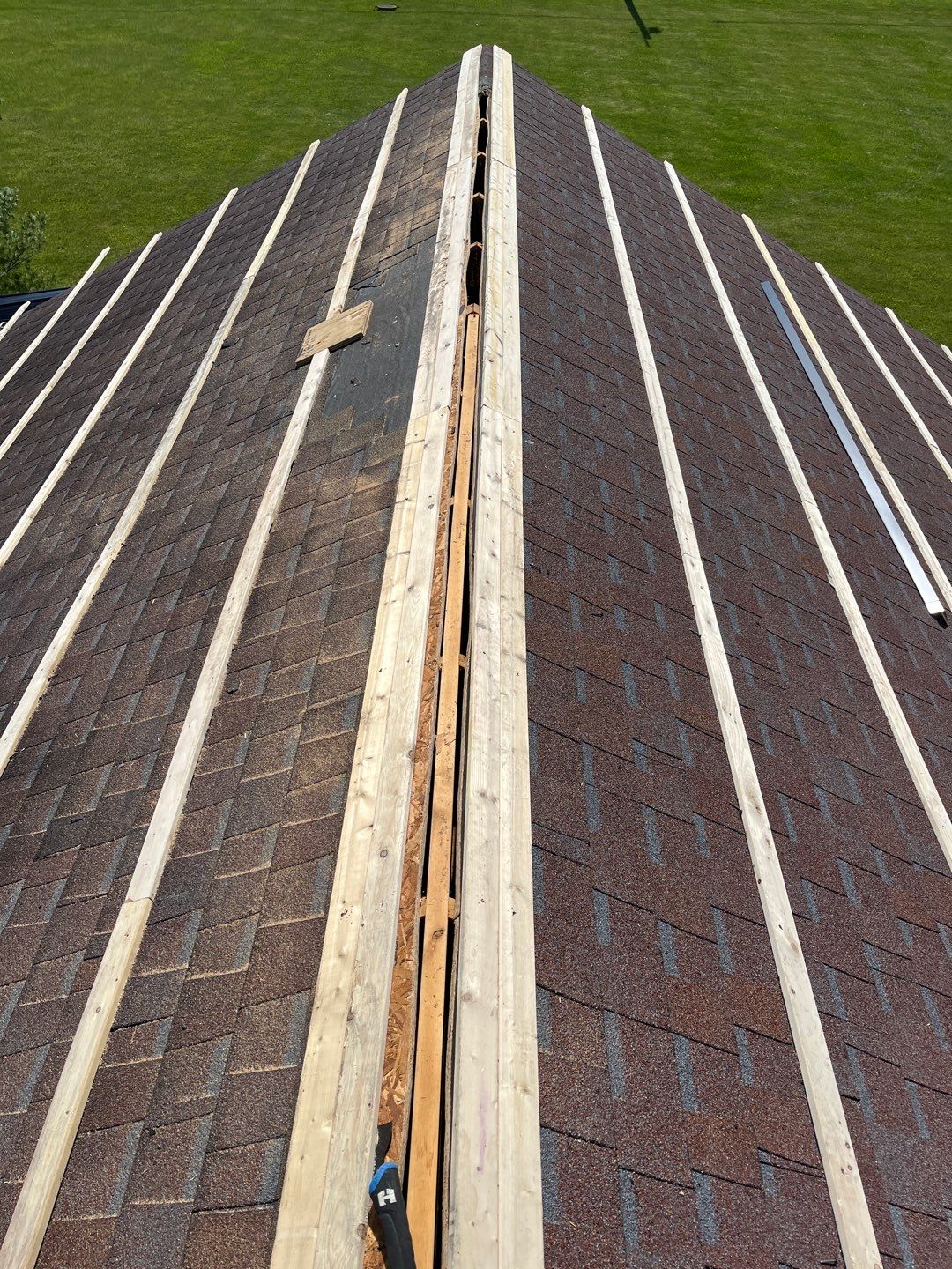 Residential Roofing Installation using Perfromance Panel Metal - Black by RoofX 