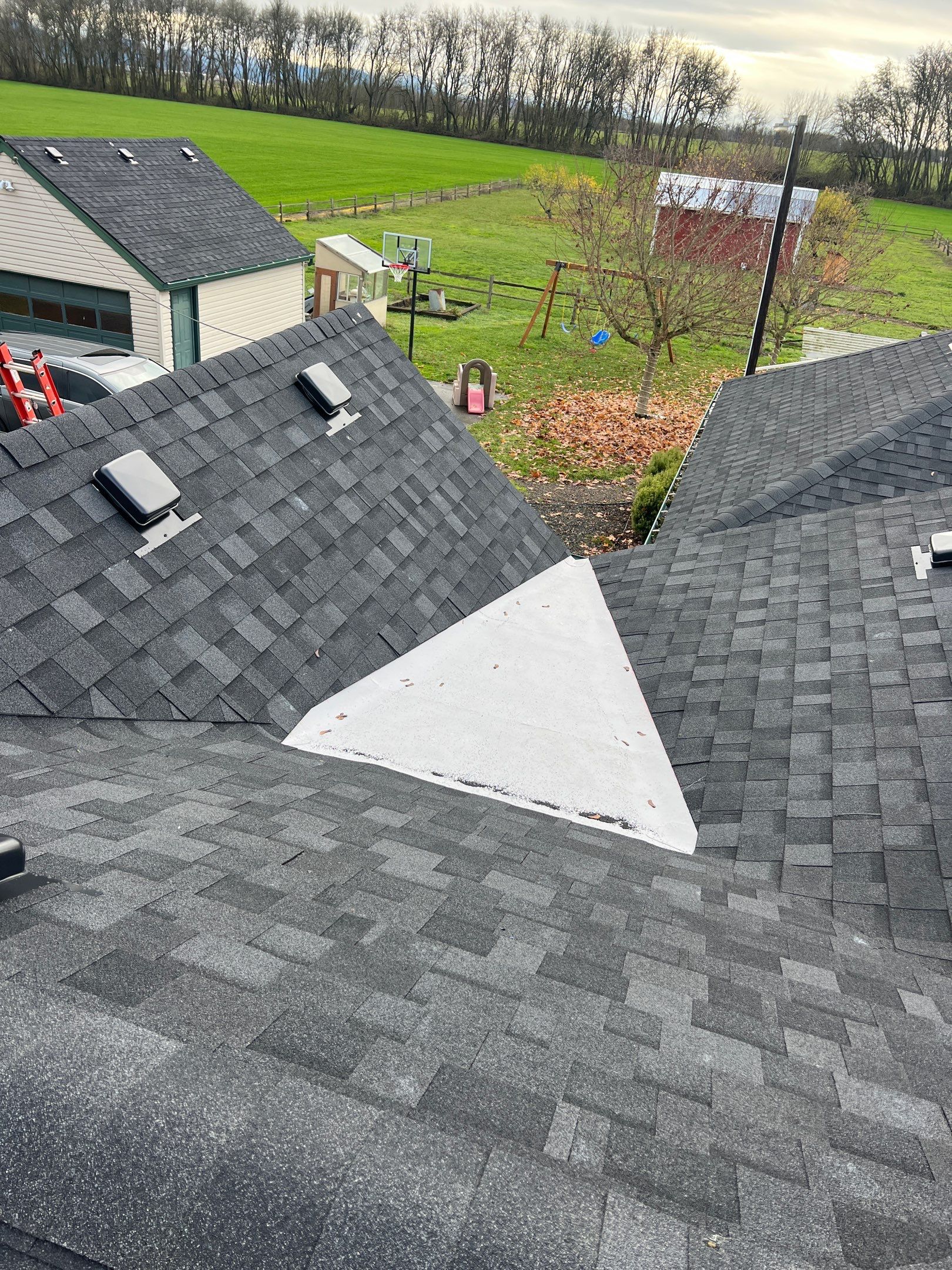 Residential Roofing Installation using IKO Dynasty (Color: Granite Black) by Orezona Building & Roofing Company, Inc.