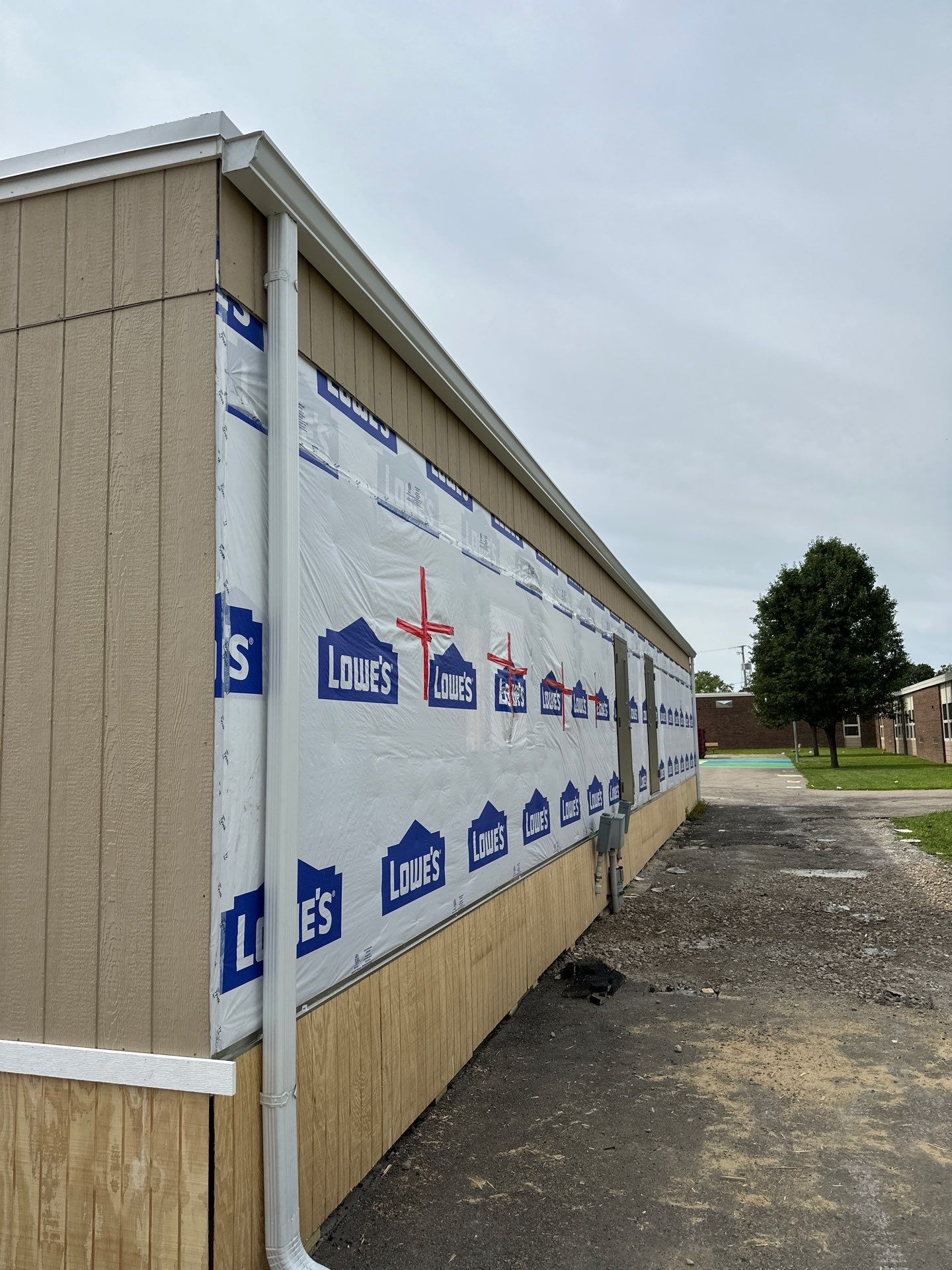Commercial Flat Roof and Siding by Nitro Roofing and Construction