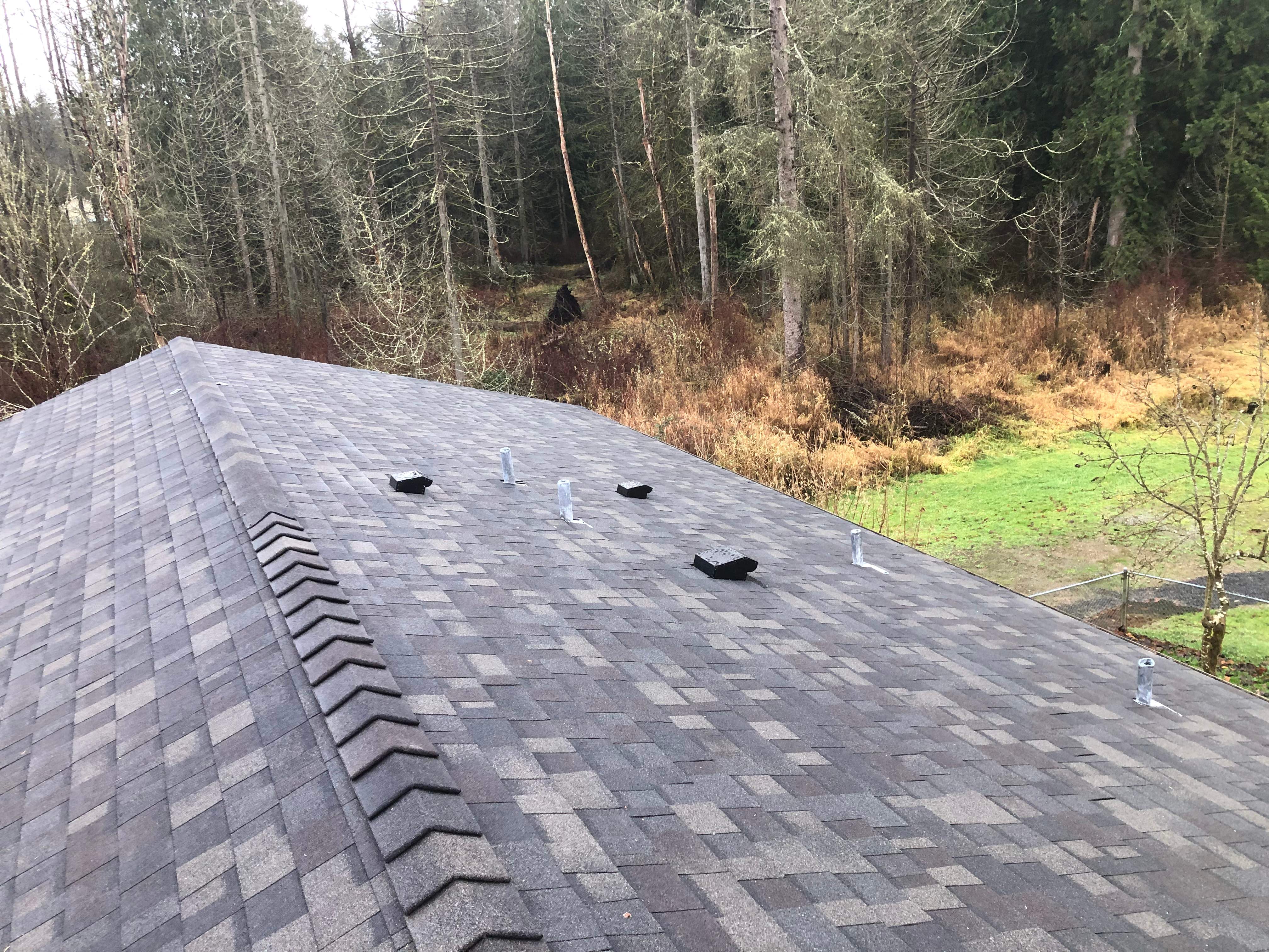 Shop and house by RoofWorks Northwest