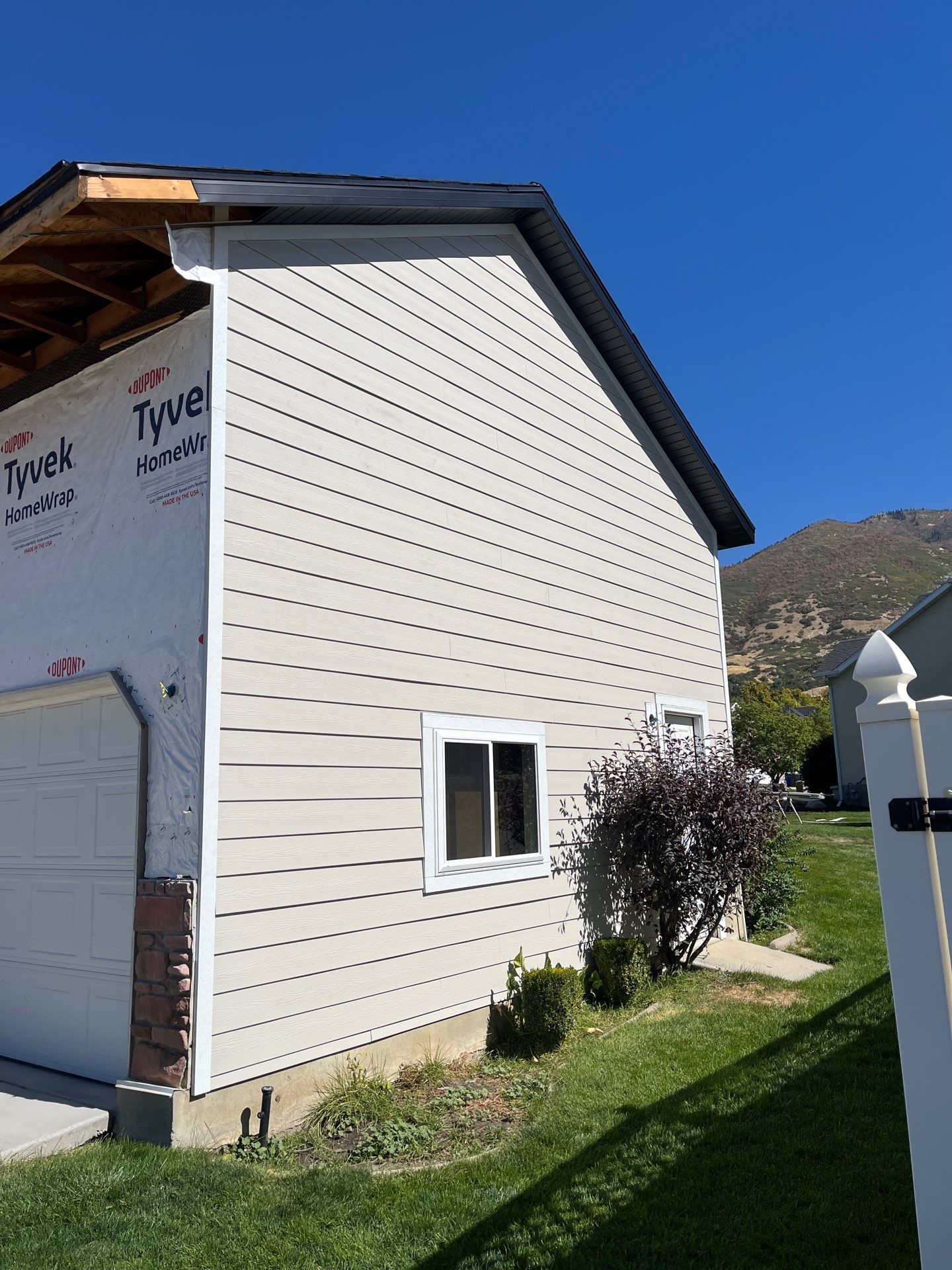 Farmington | Stucco/Vinyl Demo & Hardie Conversion | Cobble Stone & Black by Ideal Siding Utah