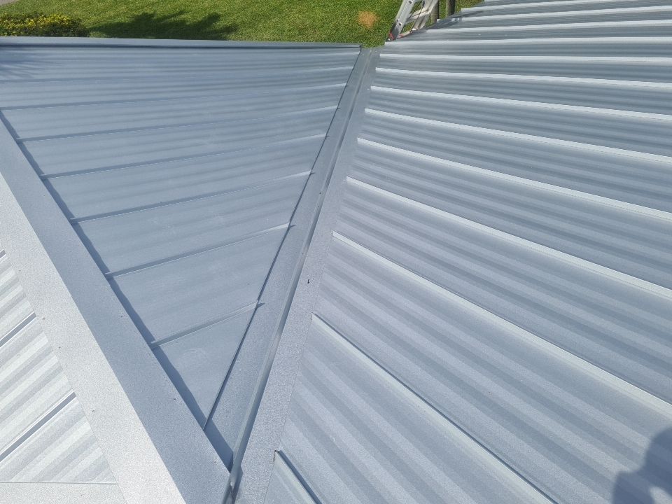 Residential Roofing Installation using 1" Nail strip metal roof by BLUES BROTHERS ROOFING