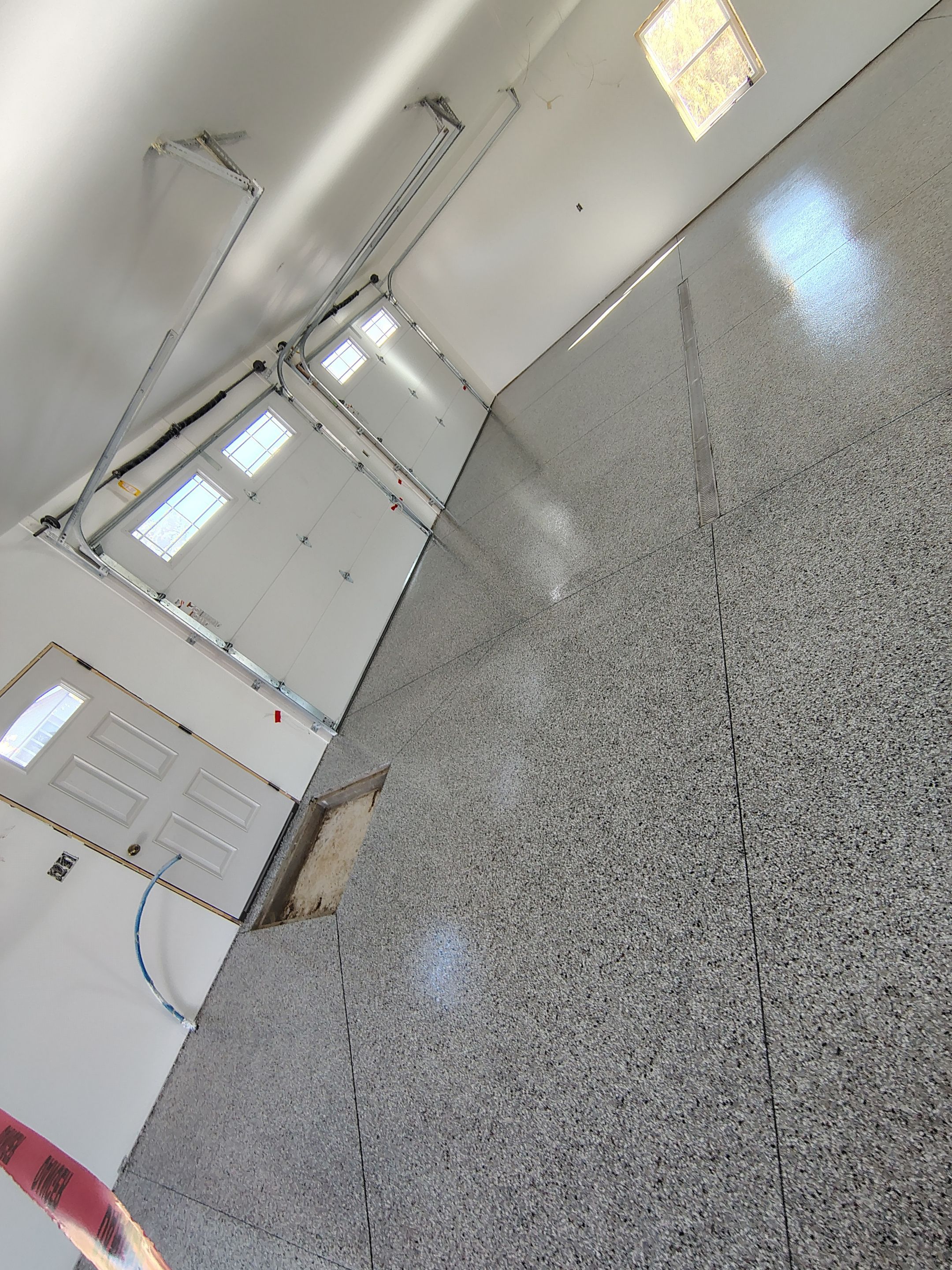 Custom Garage and Basement Epoxy Floor Coating in Menno by Select Painting, Coatings & Garage Cabinets
