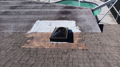 REPLACE NON APPROVED SKYLIGHT ALONG WITH CLOGED GUTTER