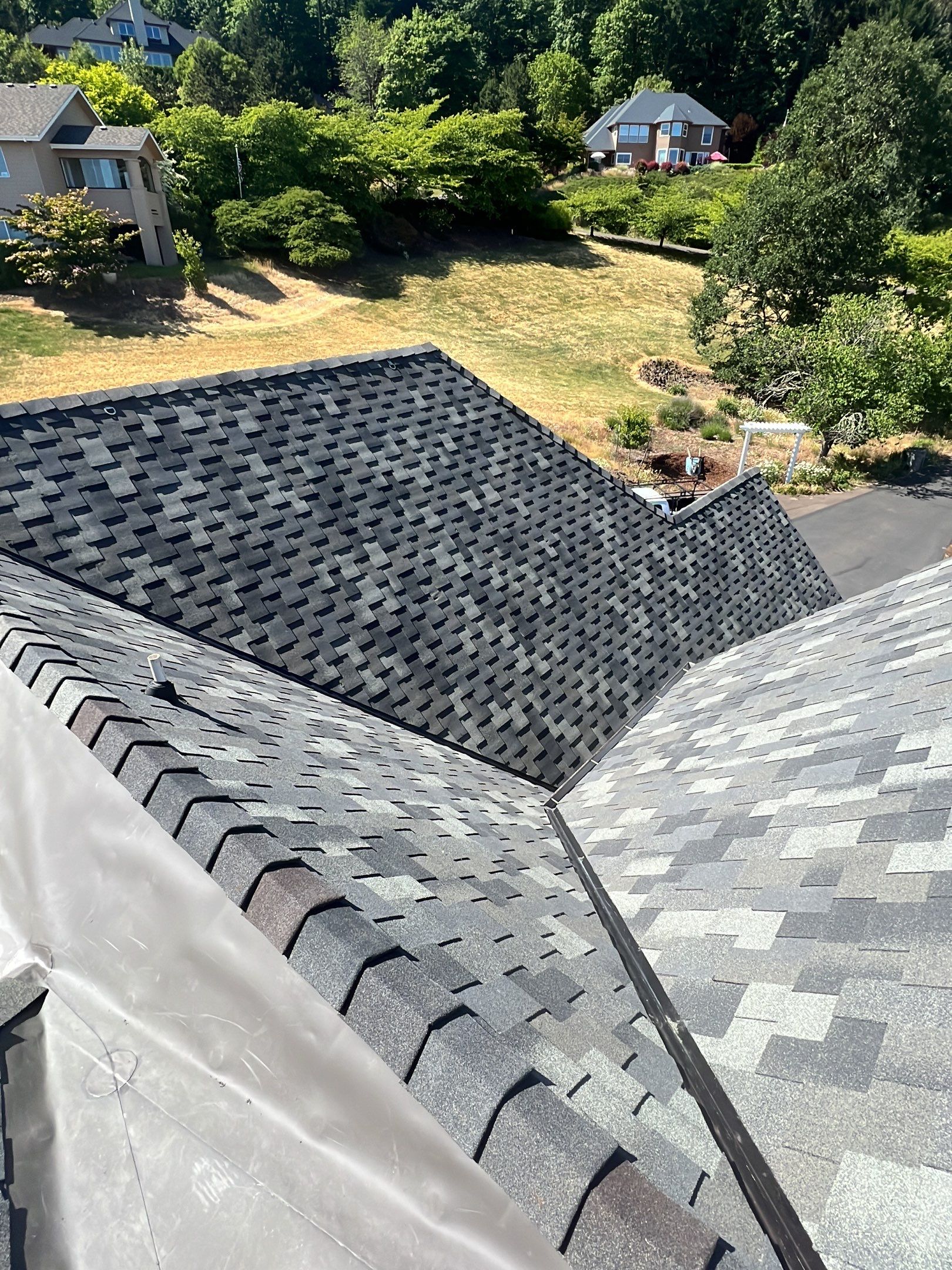 Residential Roofing Installation using Malarkey Windsor 50 Year Shingle (Color: Storm Grey) by Orezona Building & Roofing Company, Inc.