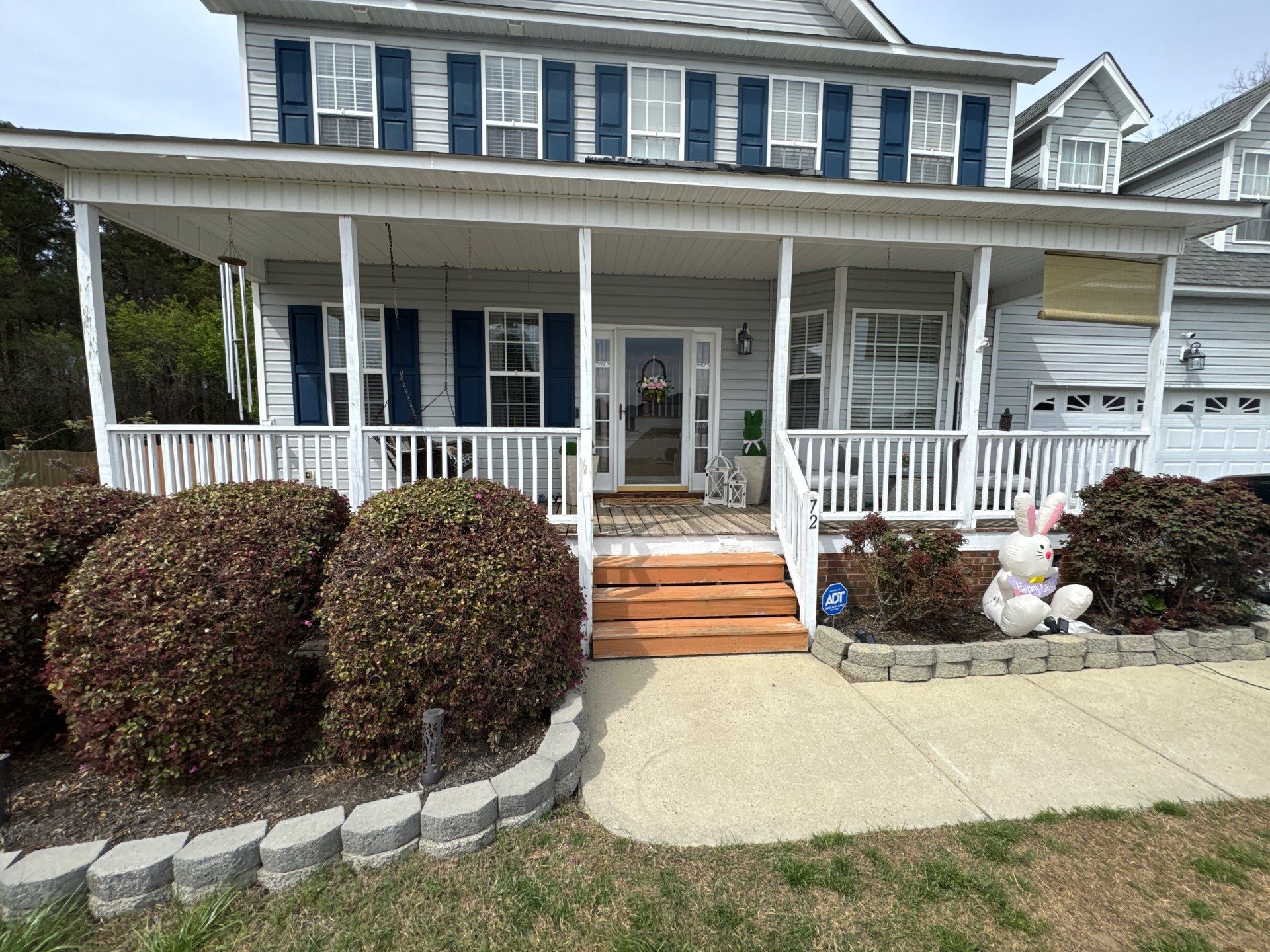 Willow Spring Composite Deck Resurface and Black Railing Upgrade by The Remodeling Company