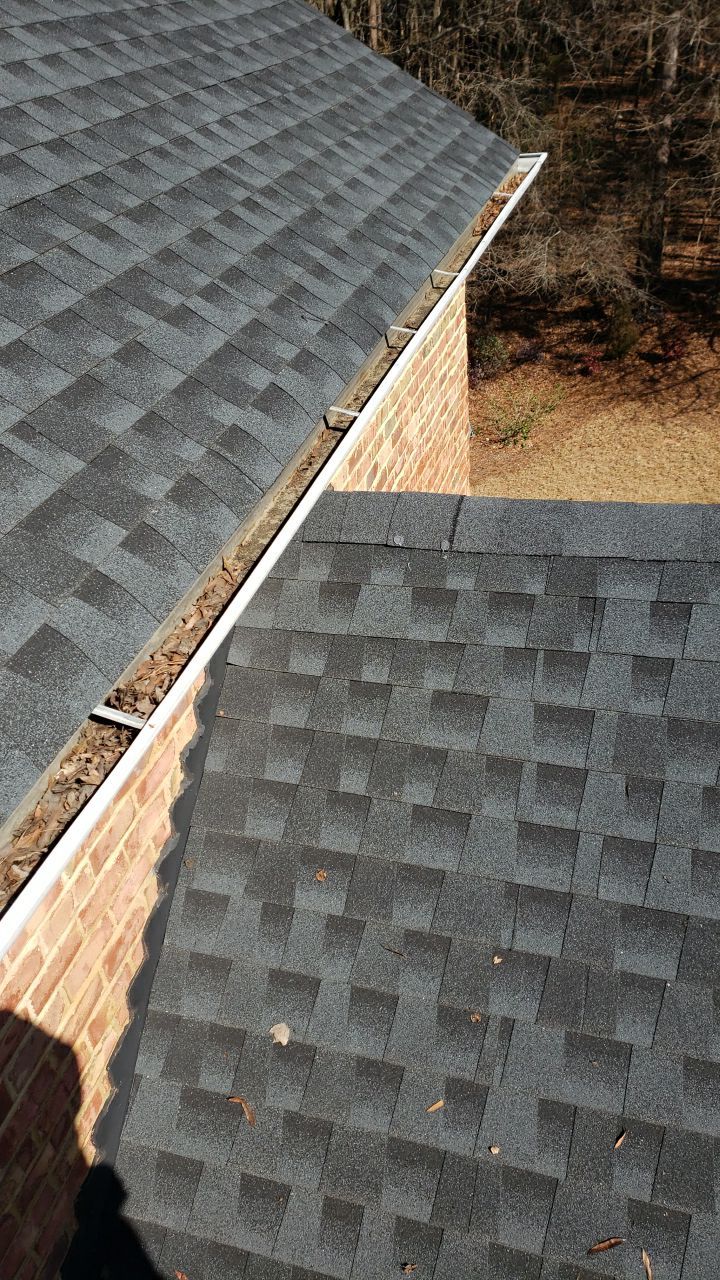 Gutter Cleaning using water by Power Wash Masters LLC