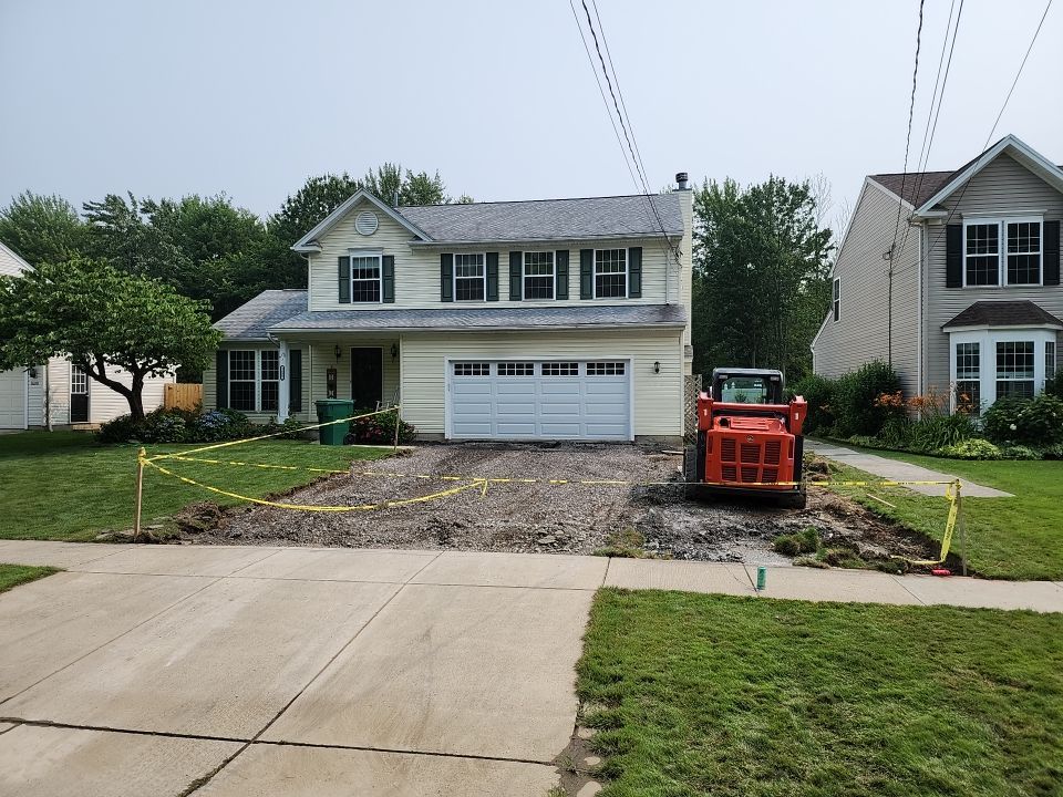 Stamped Concrete, Entry Door, and Concrete  by Ivy Lea Construction
