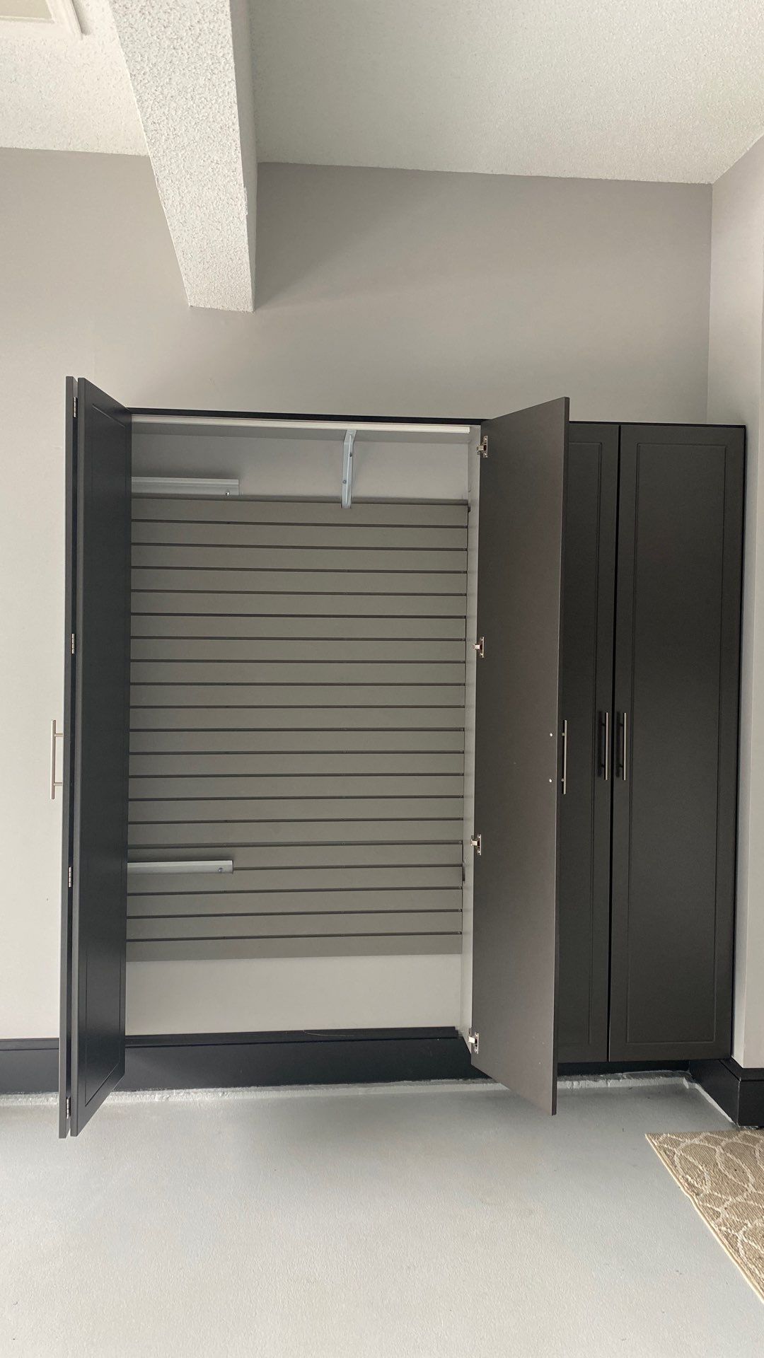 Doug M. adds storage to his garage! by Banner Garage