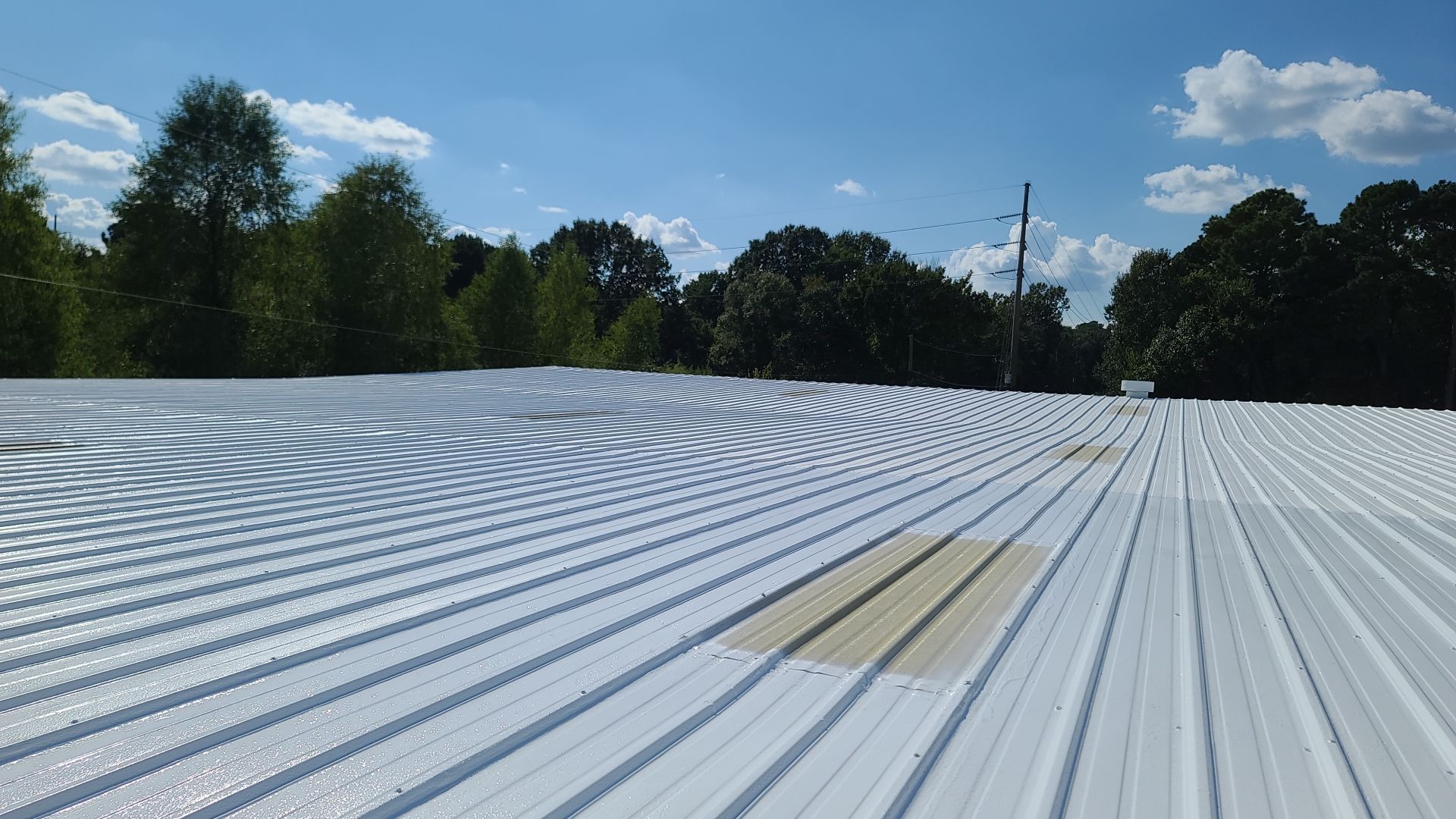 Commercial Metal Restoration System using Aldocoat Coatings by Hostetler Roofing