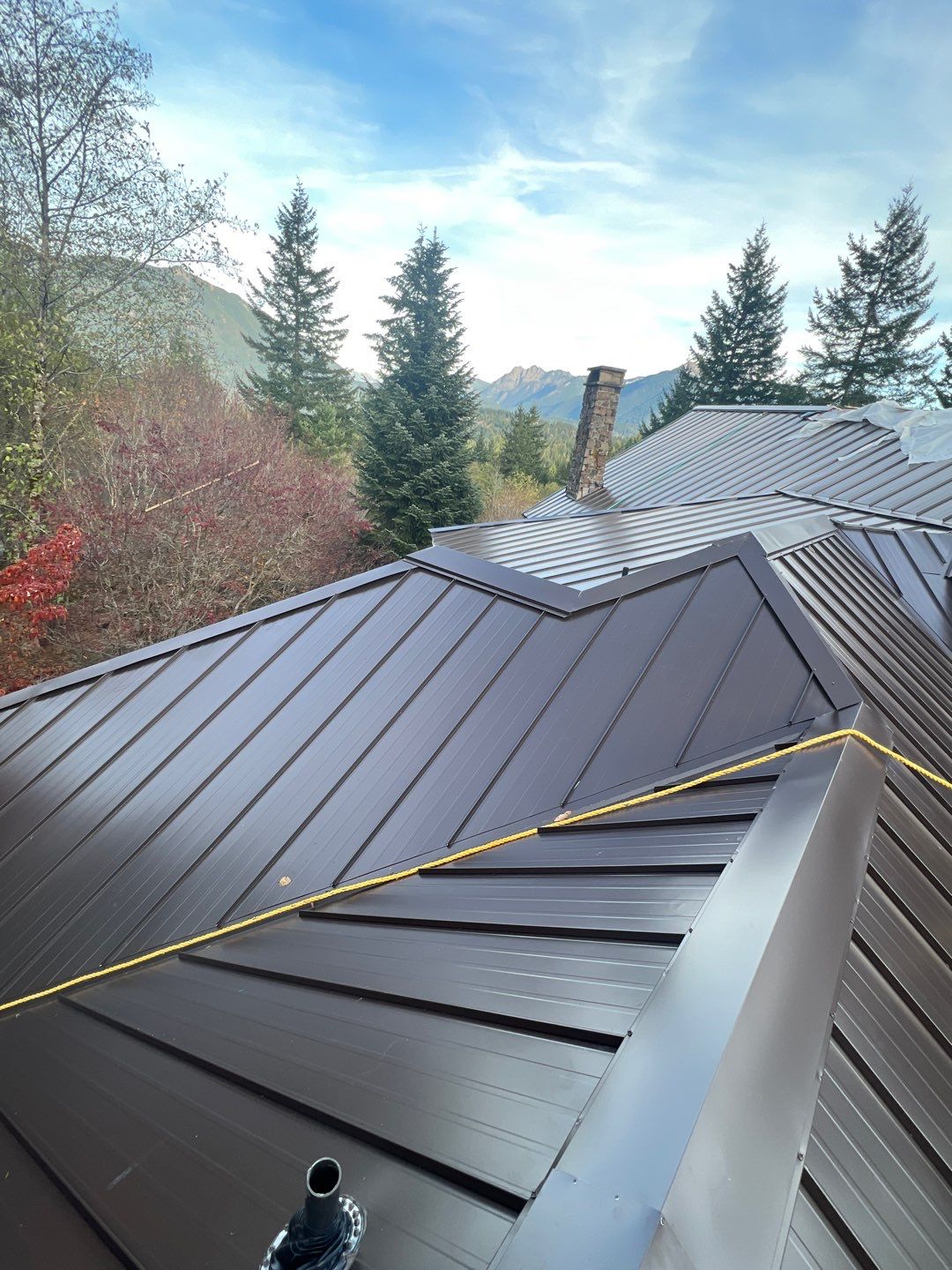 North Bend Roof Replacement using Standing Seam Metal - Dark Bronze by RoofSmart