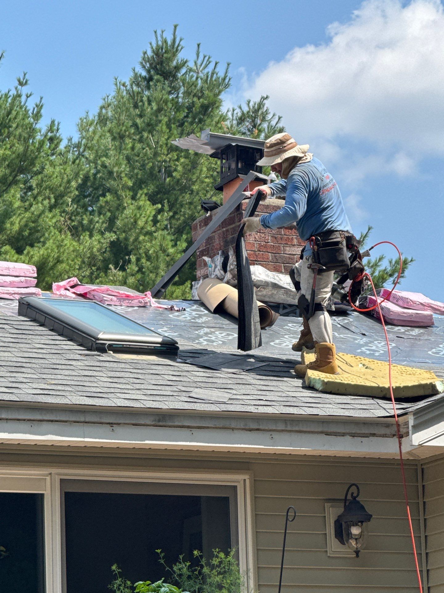 Complete Roof Replacement with Chimney Flashing, Gutter Guard System, and Vinyl Siding Repairs by Mighty Dog Roofing of Greater Middlesex County